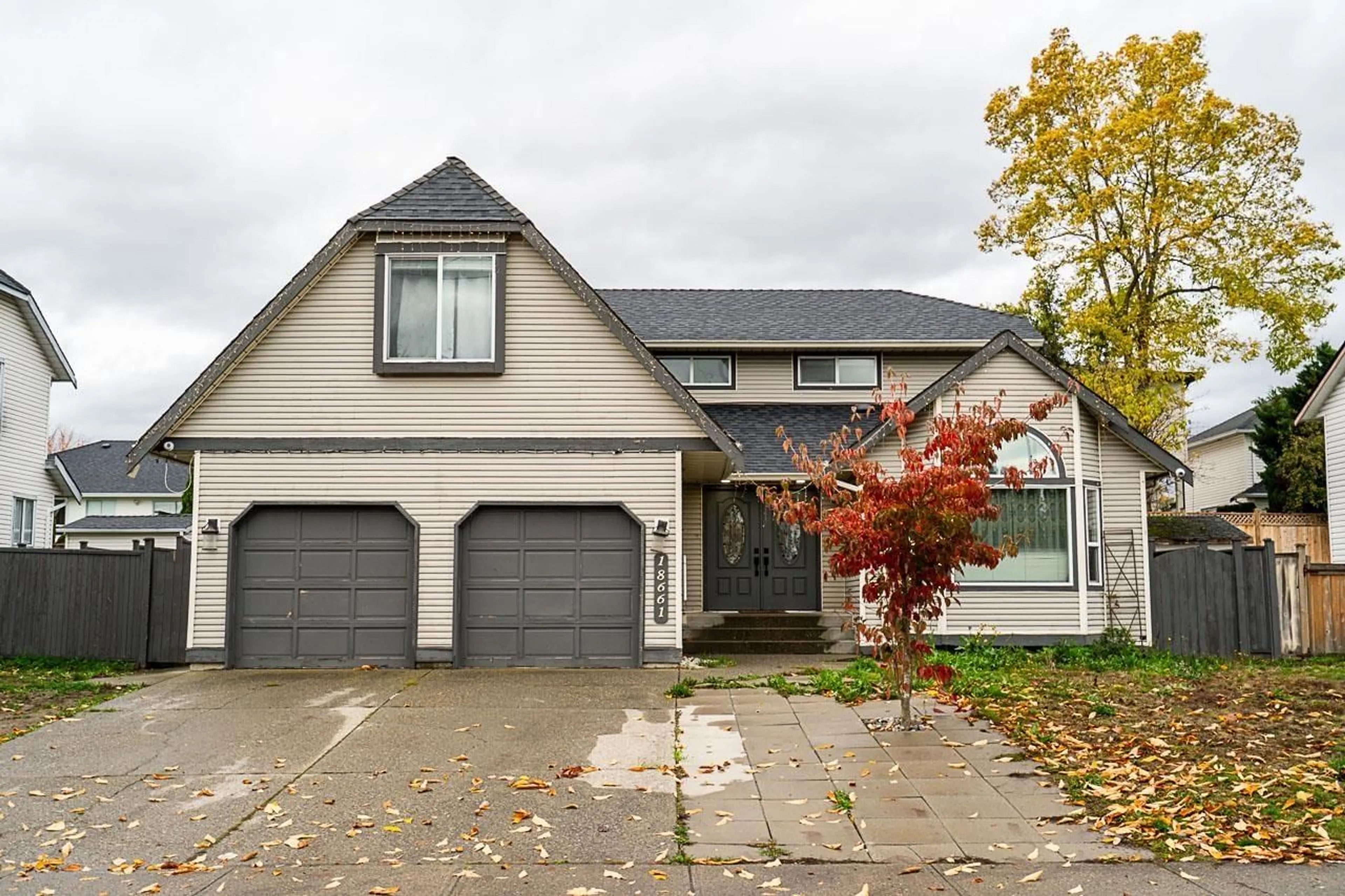 Home with vinyl exterior material, street for 18661 56 AVENUE, Surrey British Columbia V3S7Y2