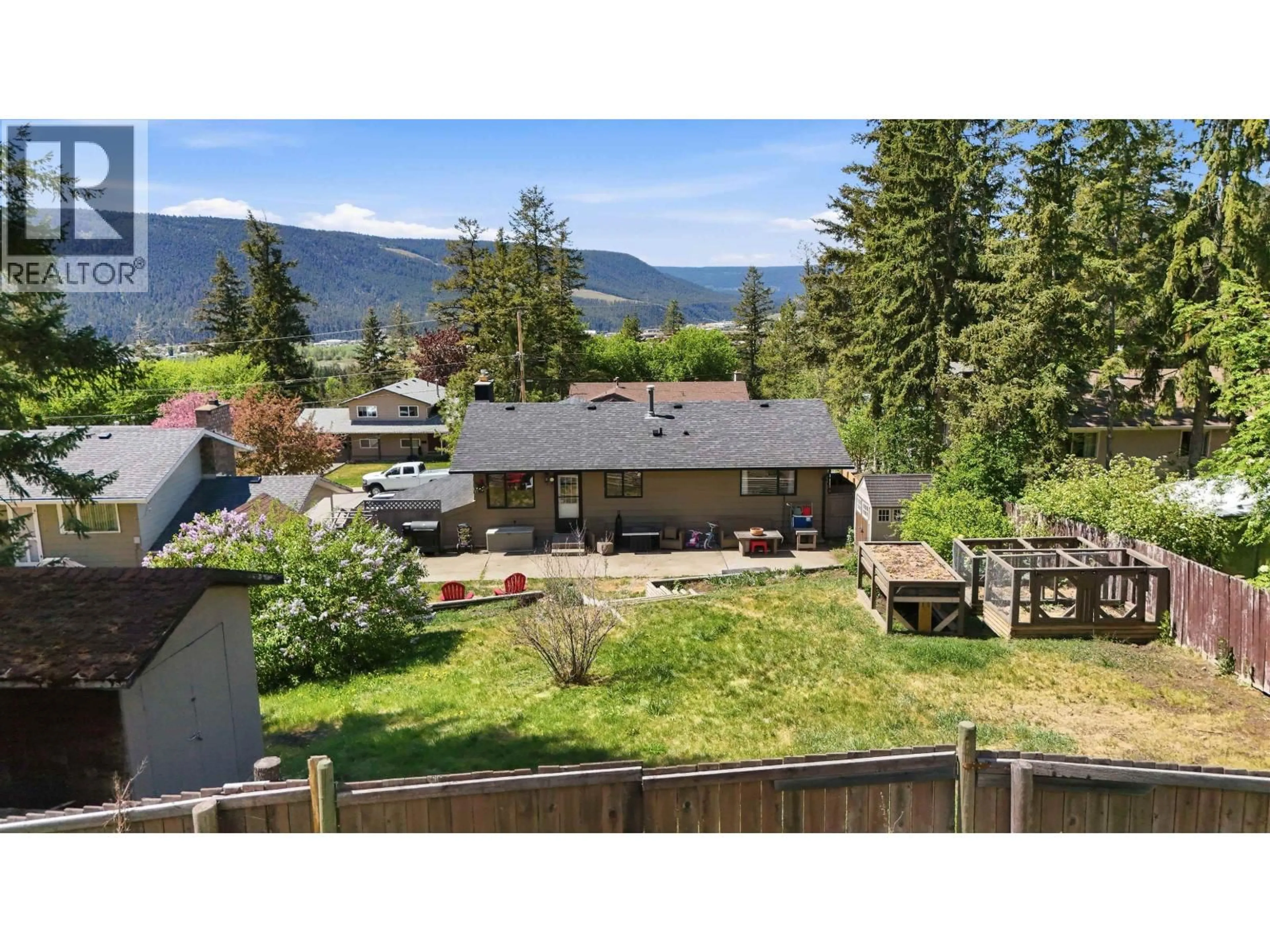 A pic from outside/outdoor area/front of a property/back of a property/a pic from drone, mountain view for 1460 TWELFTH AVENUE, Williams Lake British Columbia V2G3X4