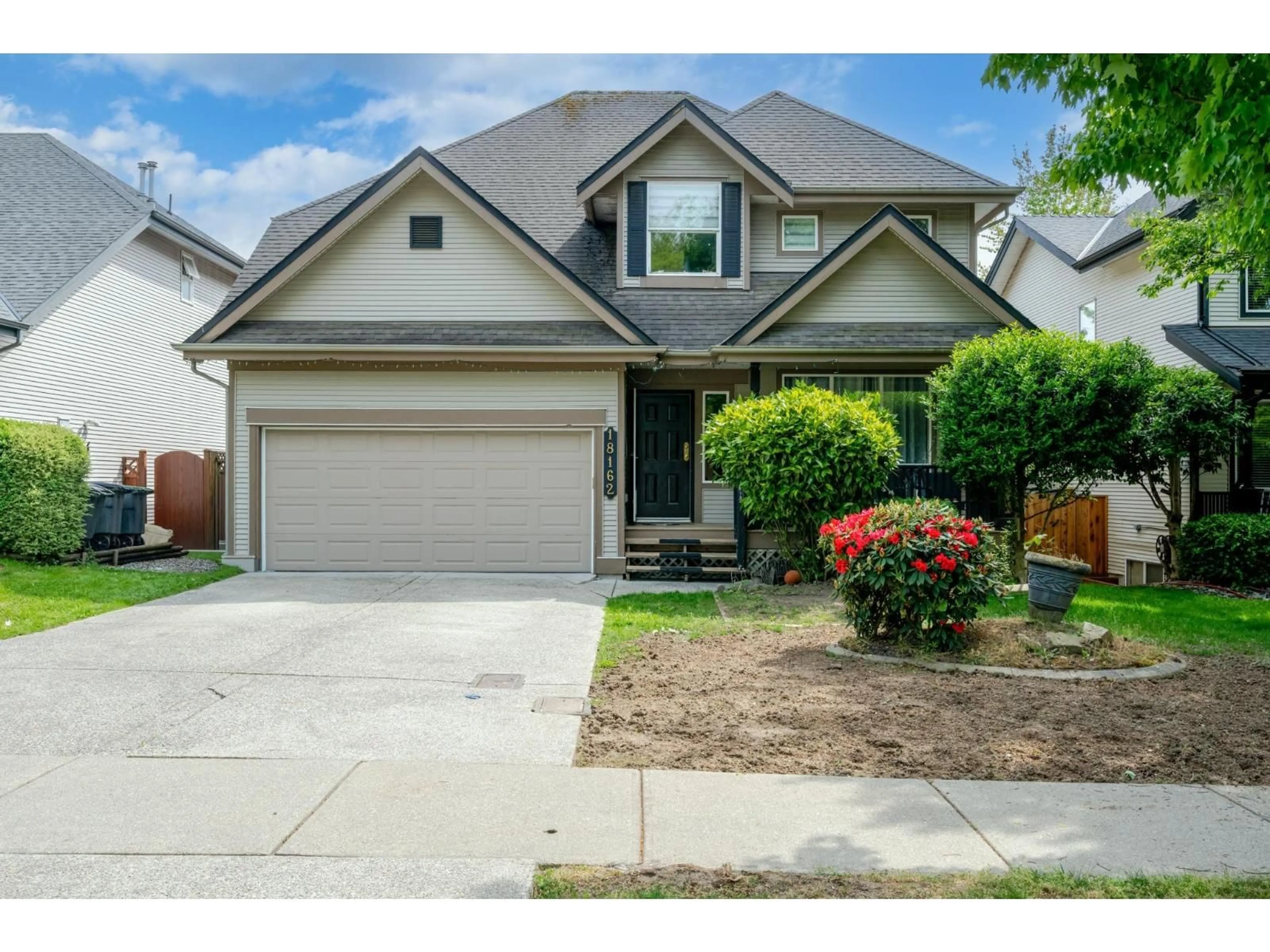 Home with vinyl exterior material, street for 18162 69 AVENUE, Surrey British Columbia V3S9C7