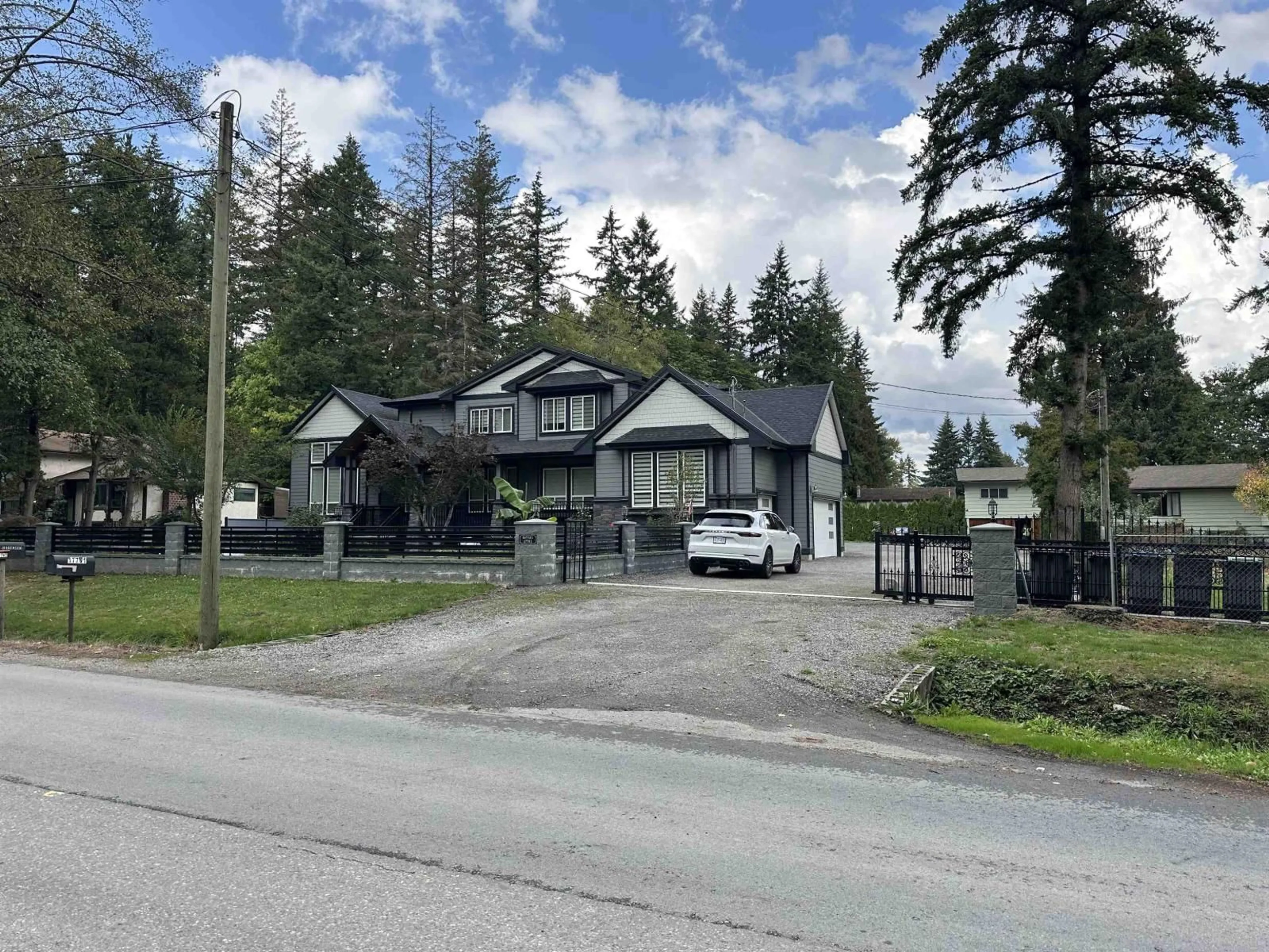 A pic from outside/outdoor area/front of a property/back of a property/a pic from drone, street for 17761 96 AVENUE, Surrey British Columbia V4N4A9