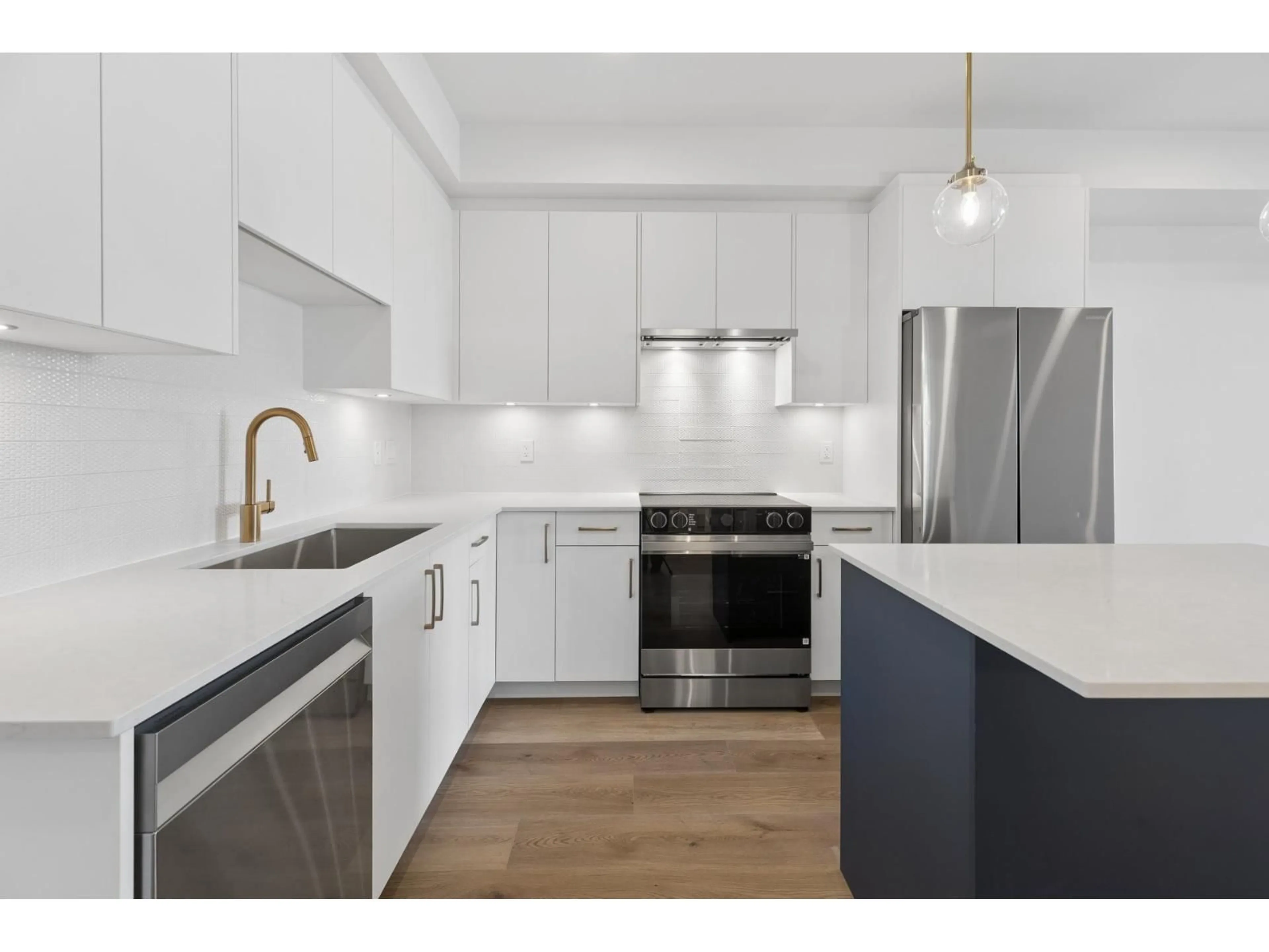 Open concept kitchen, unknown for 102 - 20286 72B AVENUE, Langley British Columbia V2Y1T2