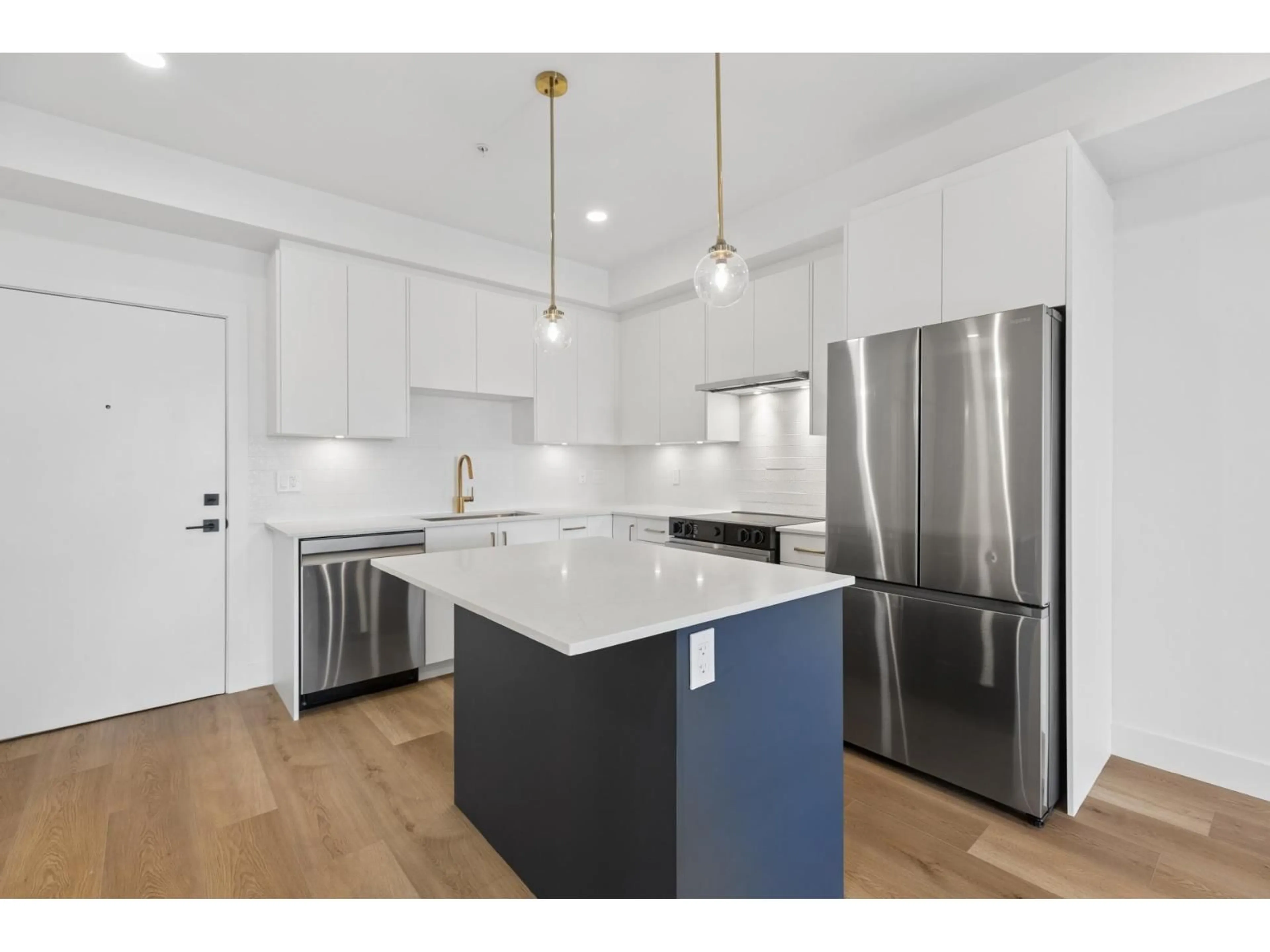 Open concept kitchen, unknown for 102 - 20286 72B AVENUE, Langley British Columbia V2Y1T2