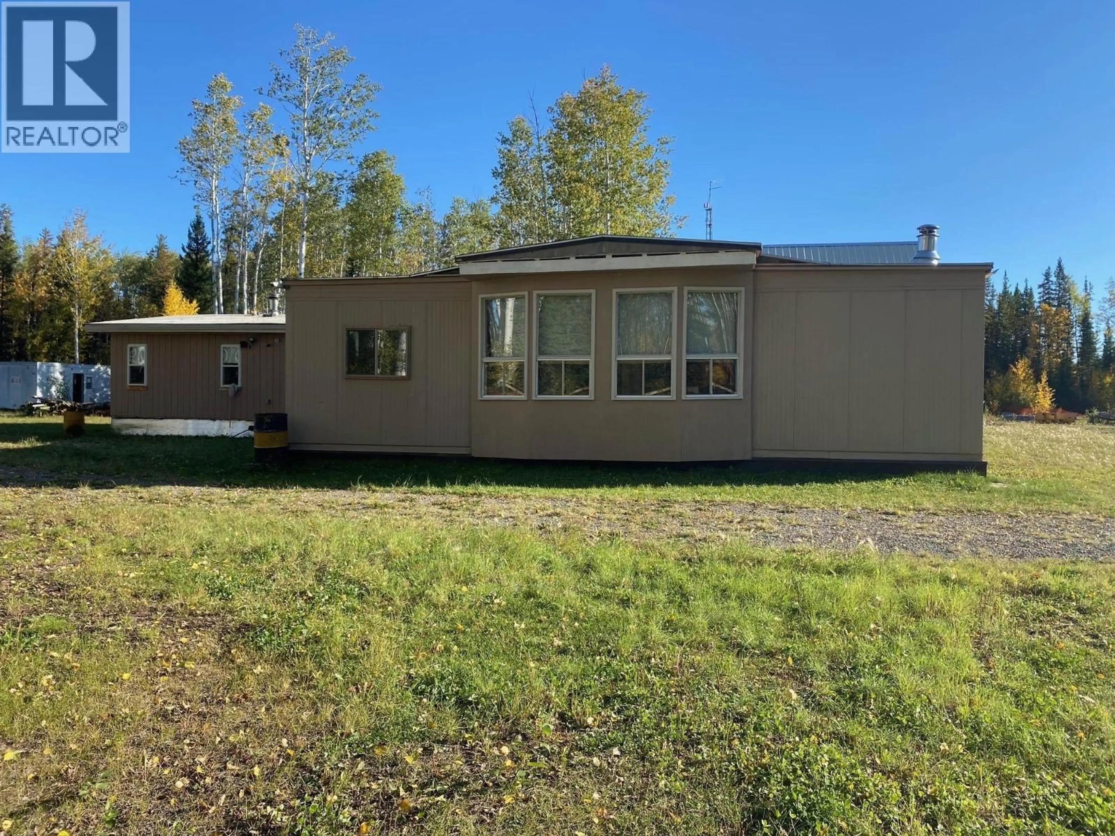 Home with vinyl exterior material, unknown for MILE - 317 LIARD HIGHWAY, Fort Nelson British Columbia V0C1R0