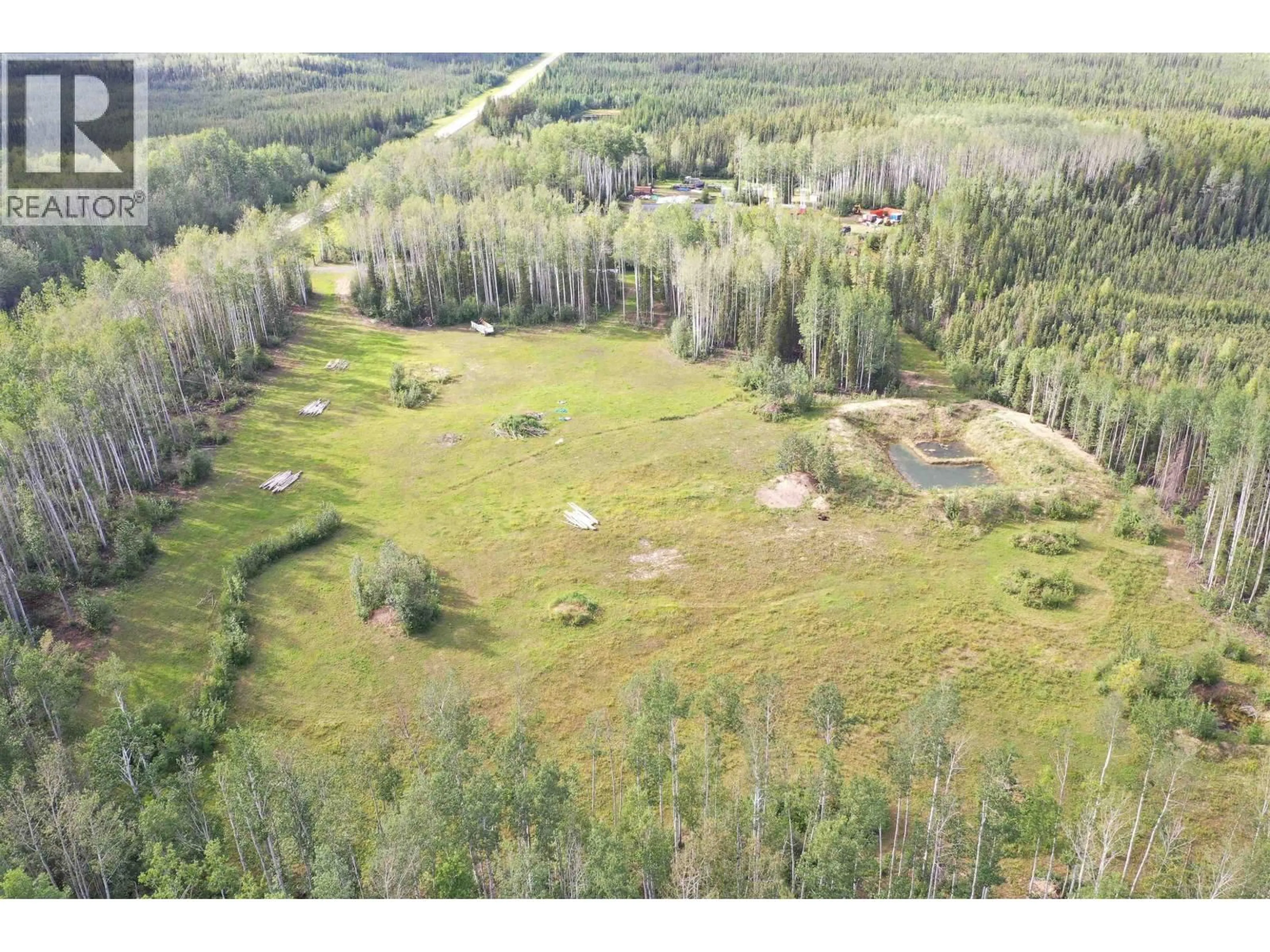 A pic from outside/outdoor area/front of a property/back of a property/a pic from drone, forest/trees view for MILE - 317 LIARD HIGHWAY, Fort Nelson British Columbia V0C1R0