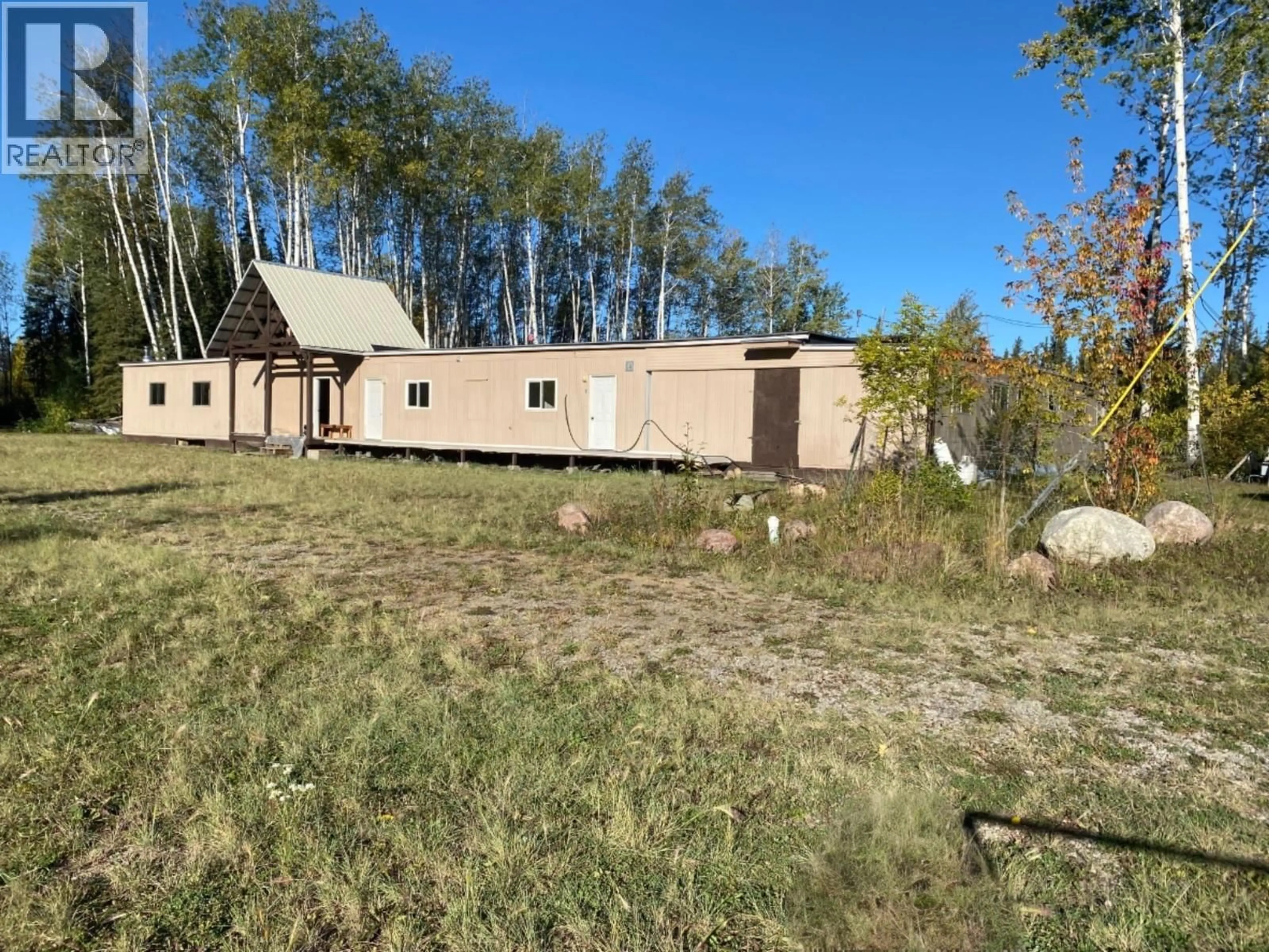 A pic from outside/outdoor area/front of a property/back of a property/a pic from drone, forest/trees view for MILE - 317 LIARD HIGHWAY, Fort Nelson British Columbia V0C1R0