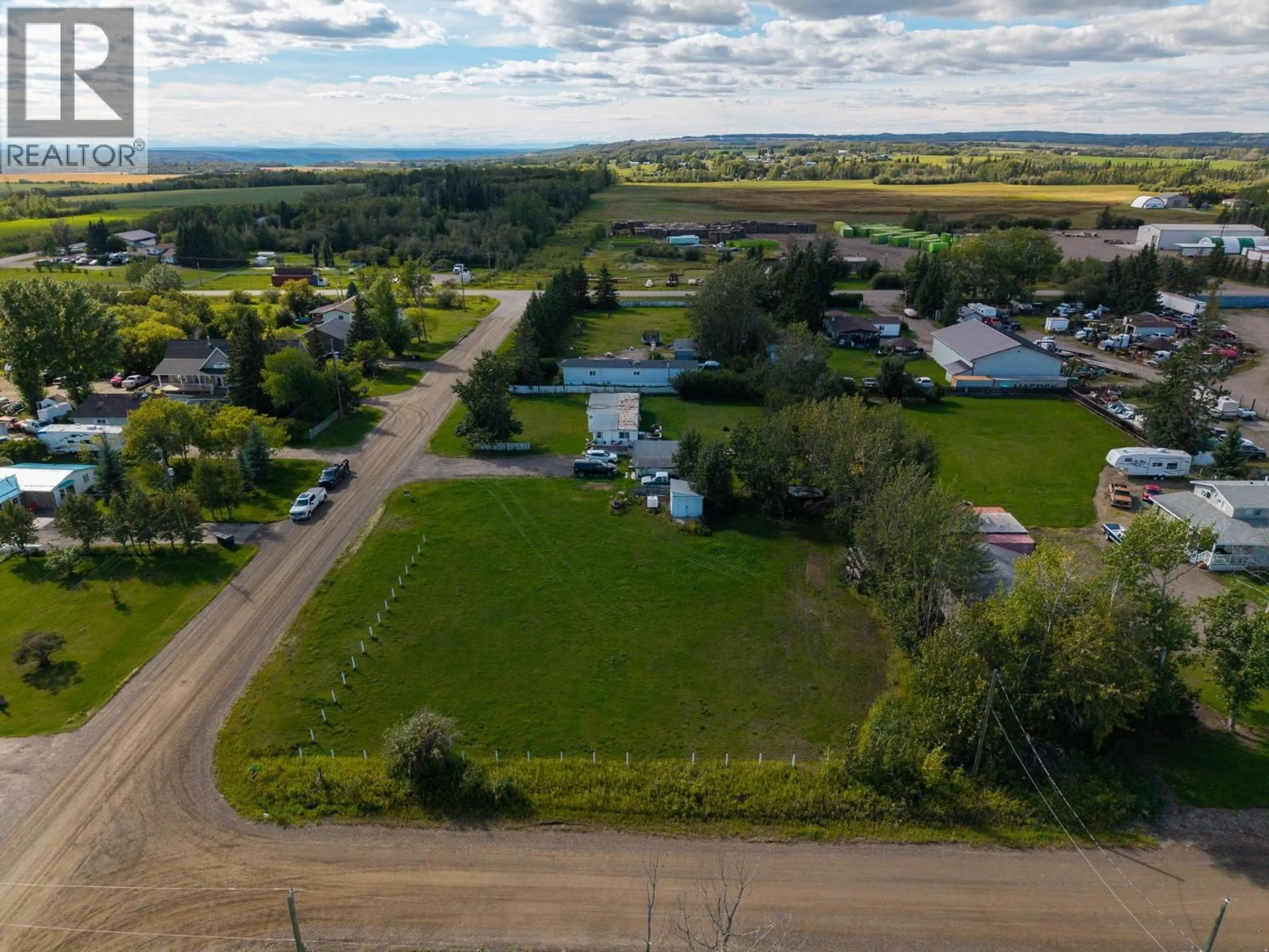 A pic from outside/outdoor area/front of a property/back of a property/a pic from drone, water/lake/river/ocean view for 12282 COTTONWOOD AVENUE, Fort St. John British Columbia V1J8B1
