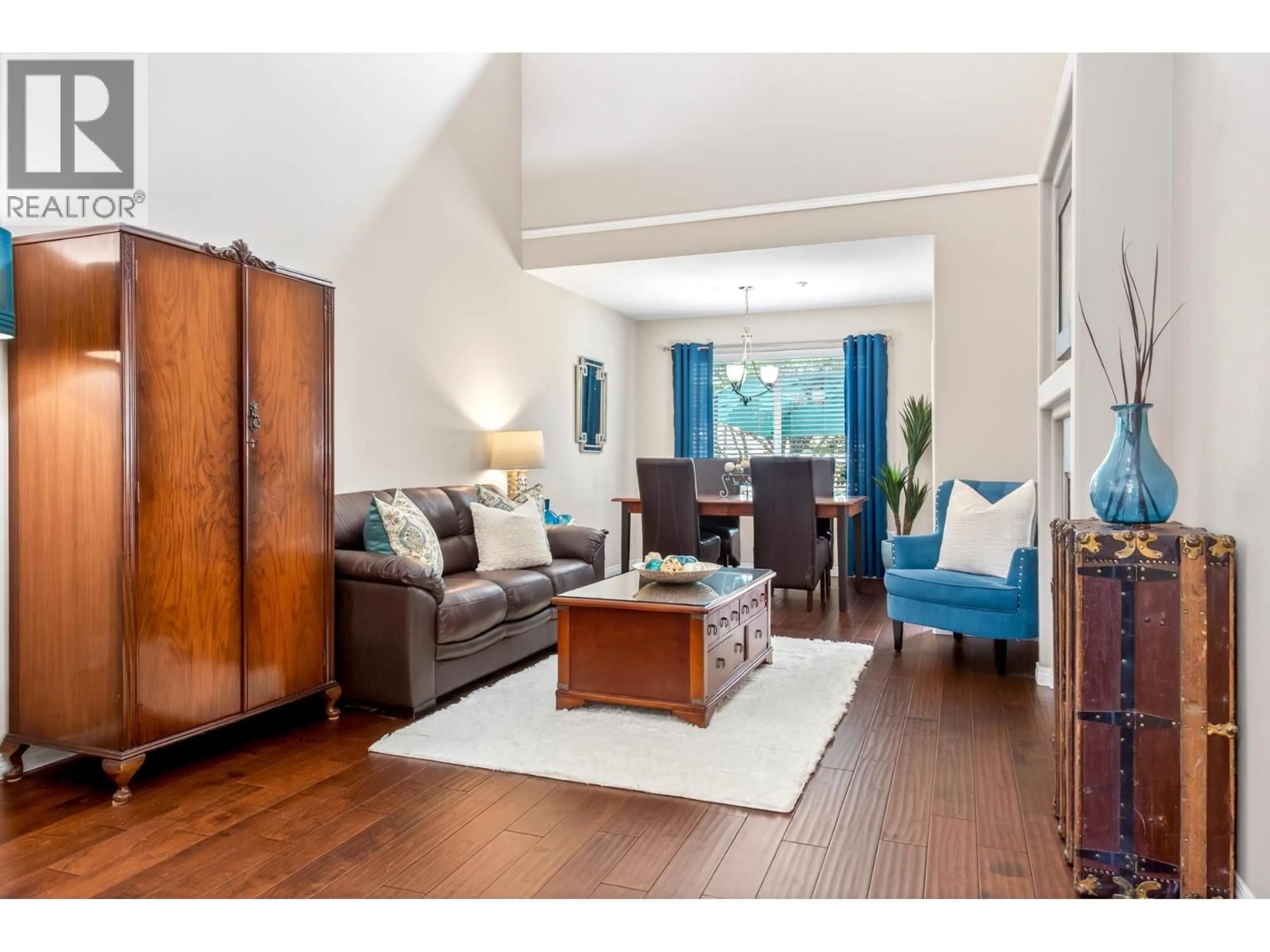 Living room with furniture, wood/laminate floor for A15 - 3075 SKEENA STREET, Port Coquitlam British Columbia V3B7T4