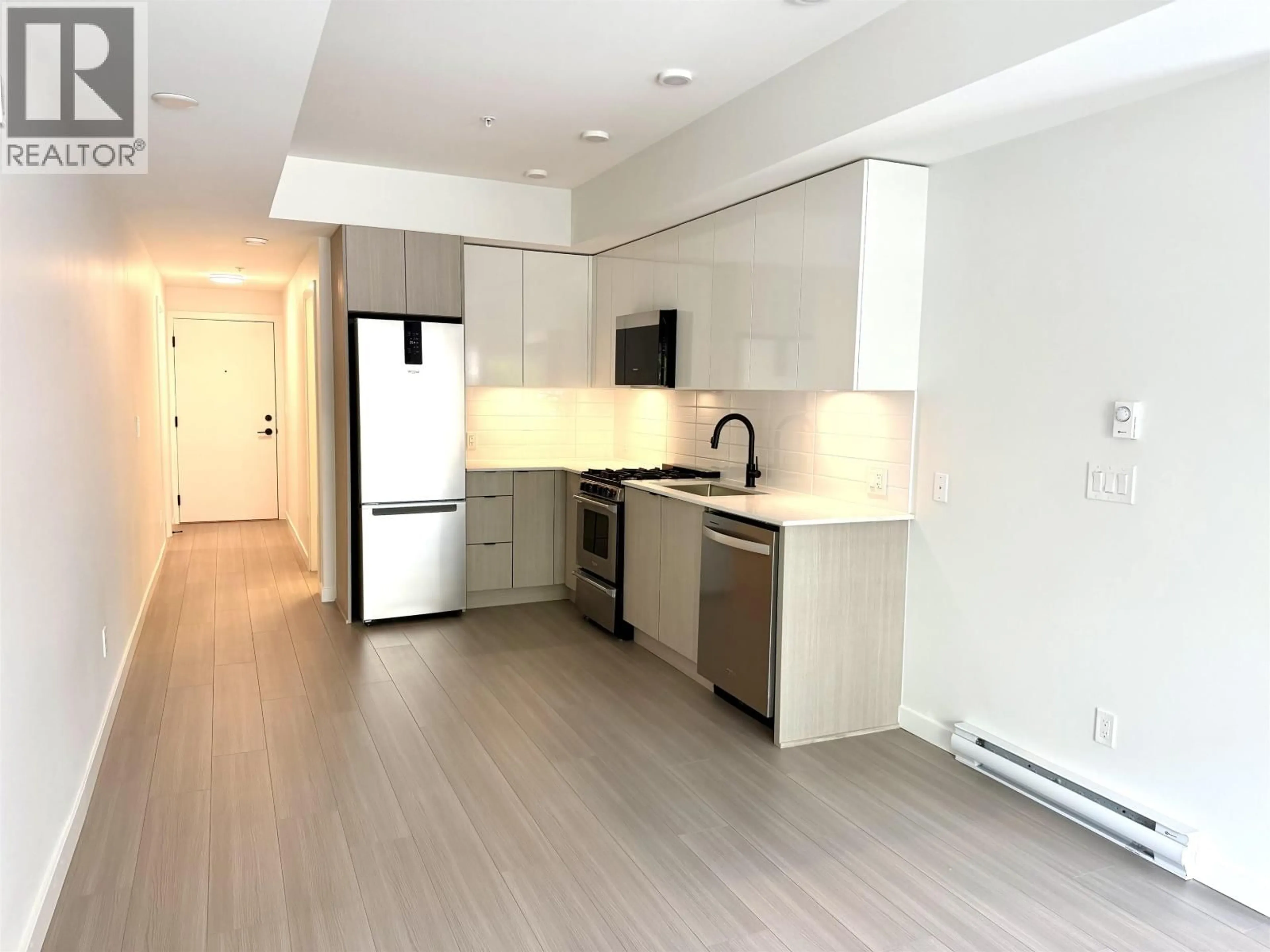 Open concept kitchen, unknown for 102 - 2277 HAWTHORNE AVENUE, Port Coquitlam British Columbia V3C1W7