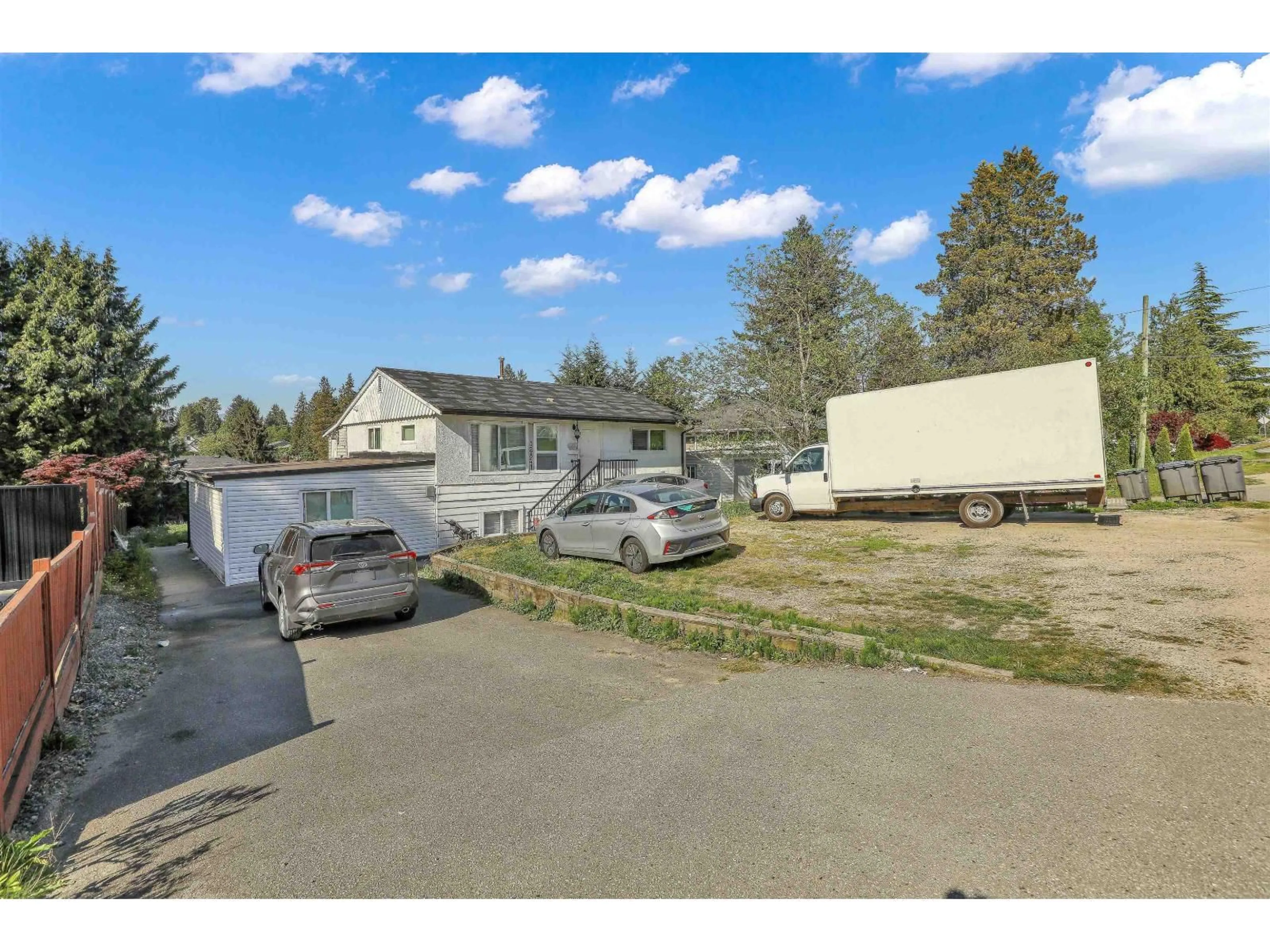 A pic from outside/outdoor area/front of a property/back of a property/a pic from drone, street for 12841 98 AVENUE, Surrey British Columbia V2T5J9
