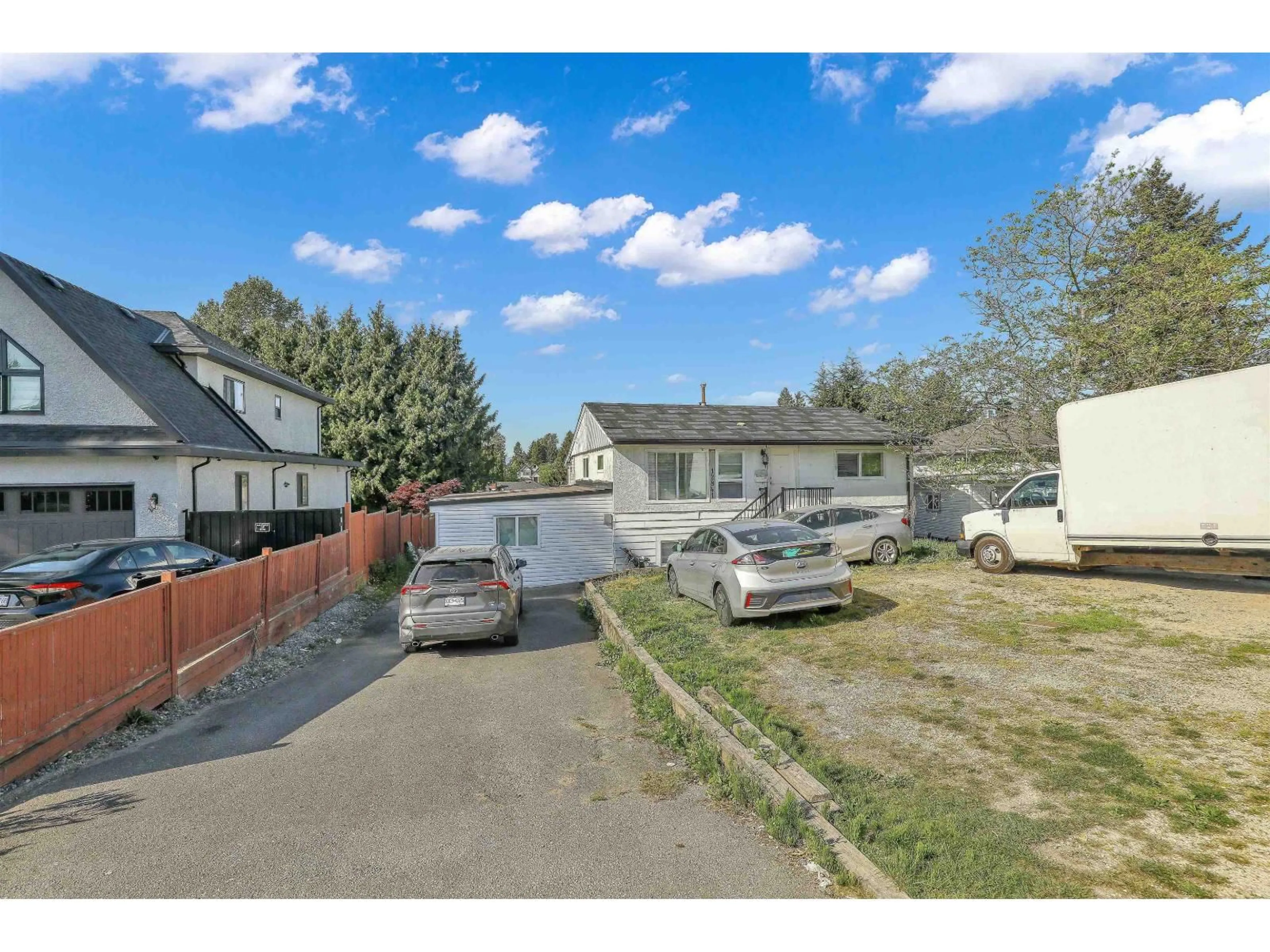 A pic from outside/outdoor area/front of a property/back of a property/a pic from drone, street for 12841 98 AVENUE, Surrey British Columbia V2T5J9