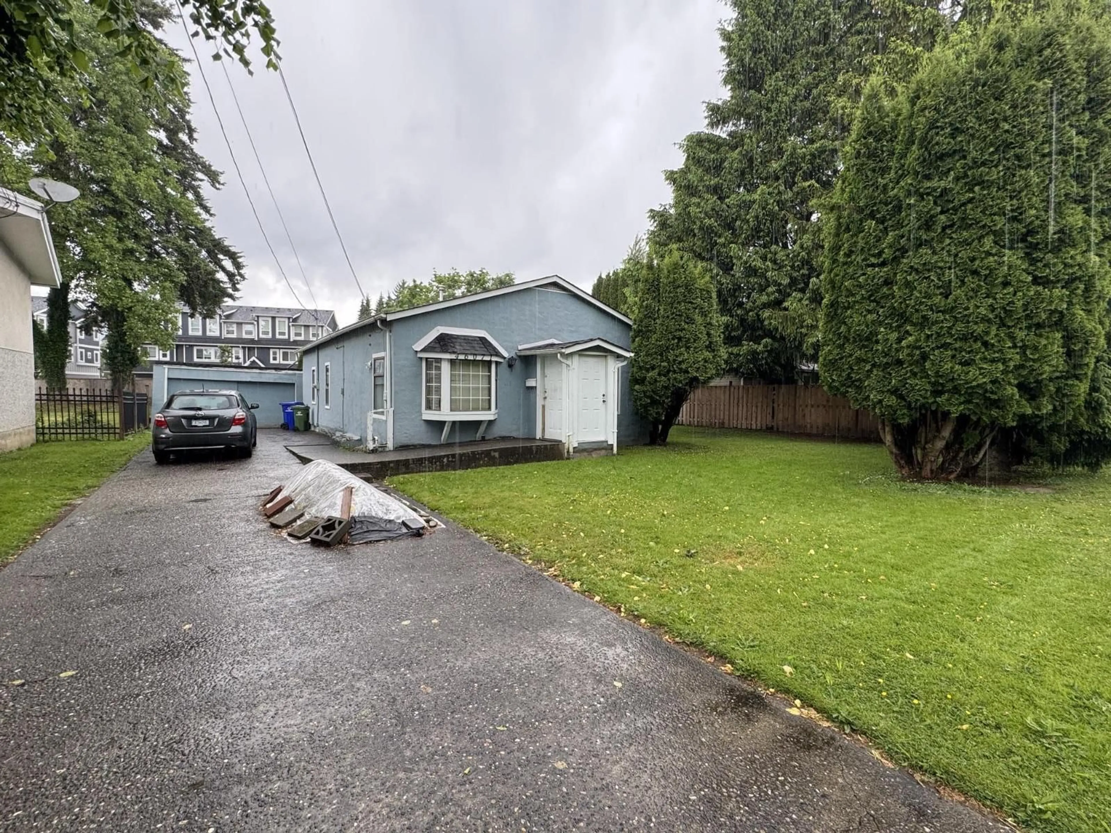 A pic from outside/outdoor area/front of a property/back of a property/a pic from drone, street for 46071 MELLARD AVENUE, Chilliwack British Columbia V2P2Y8