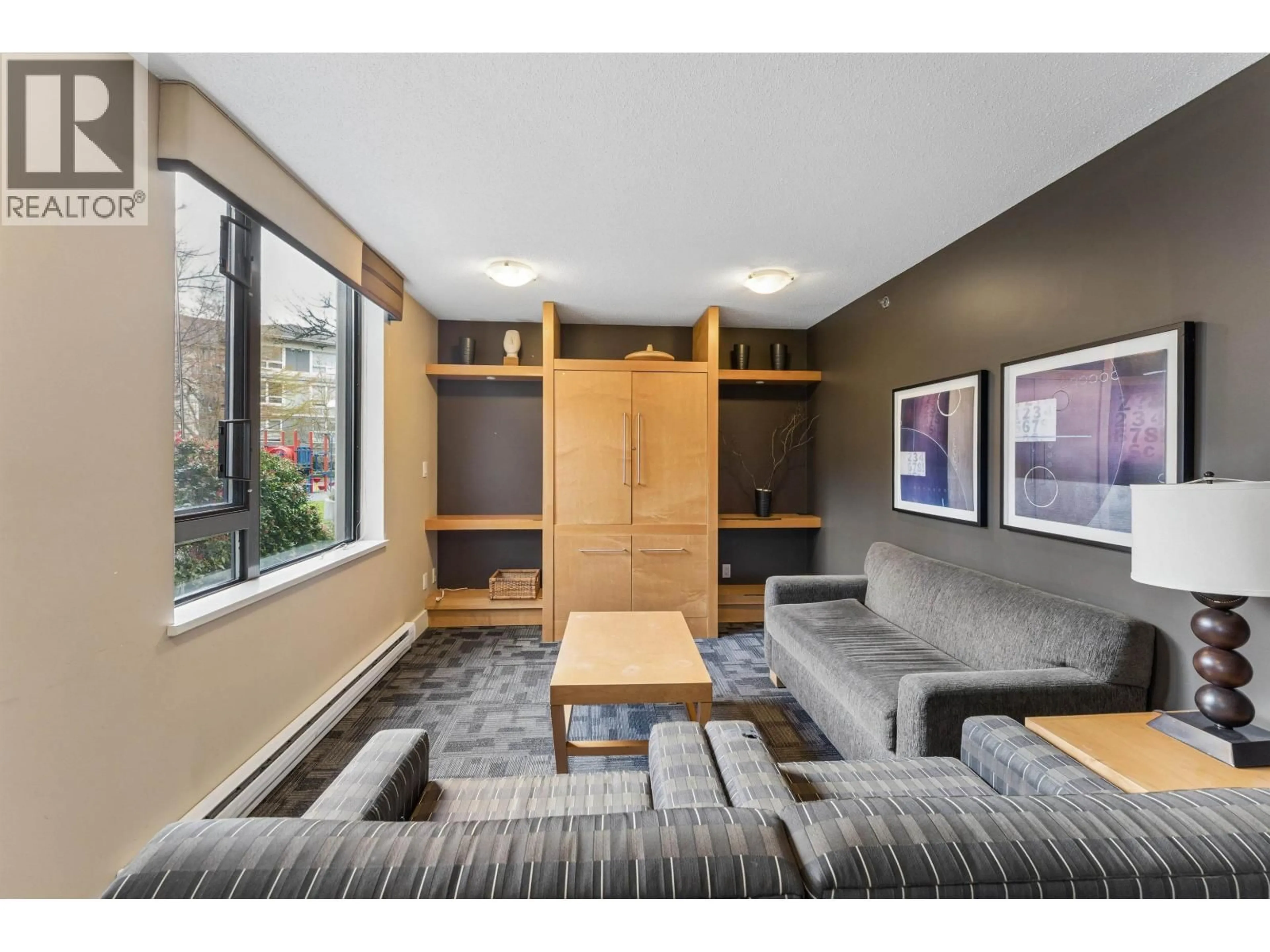 Living room with furniture, unknown for 1209 - 3588 CROWLEY DRIVE, Vancouver British Columbia V5R6H3