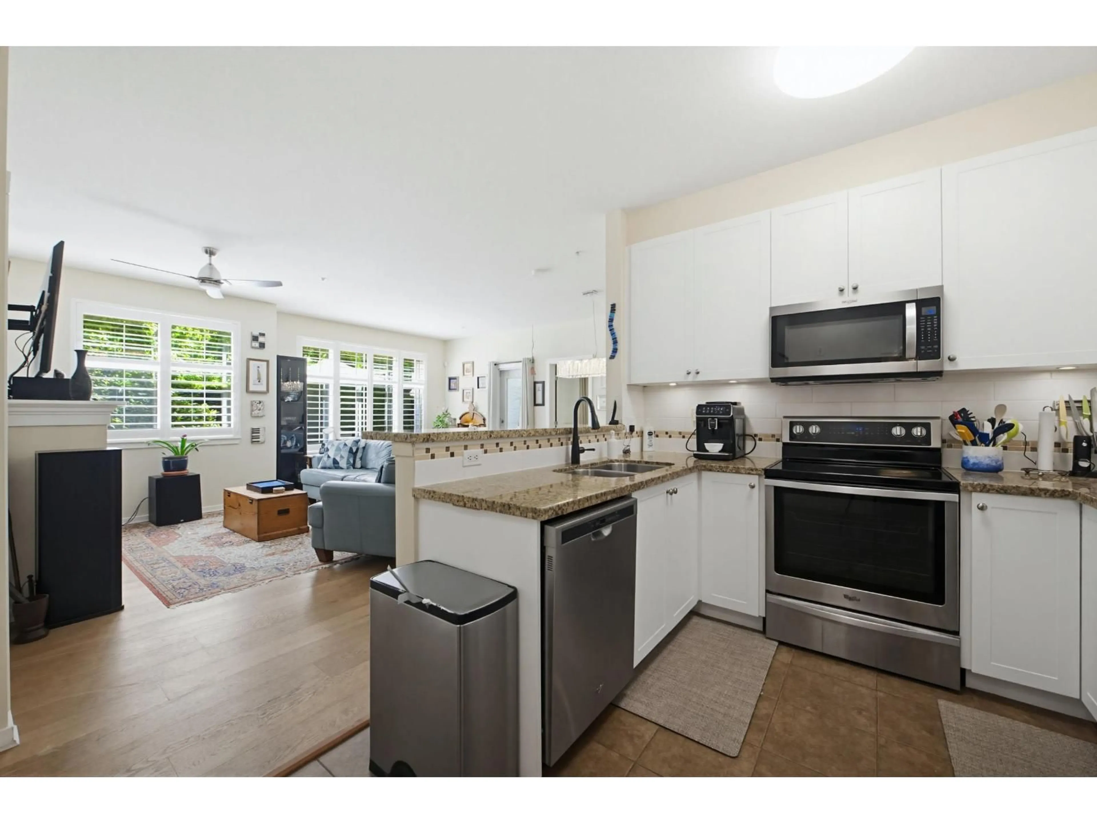 Open concept kitchen, unknown for 107 - 15299 17A AVENUE, Surrey British Columbia V4A1V4