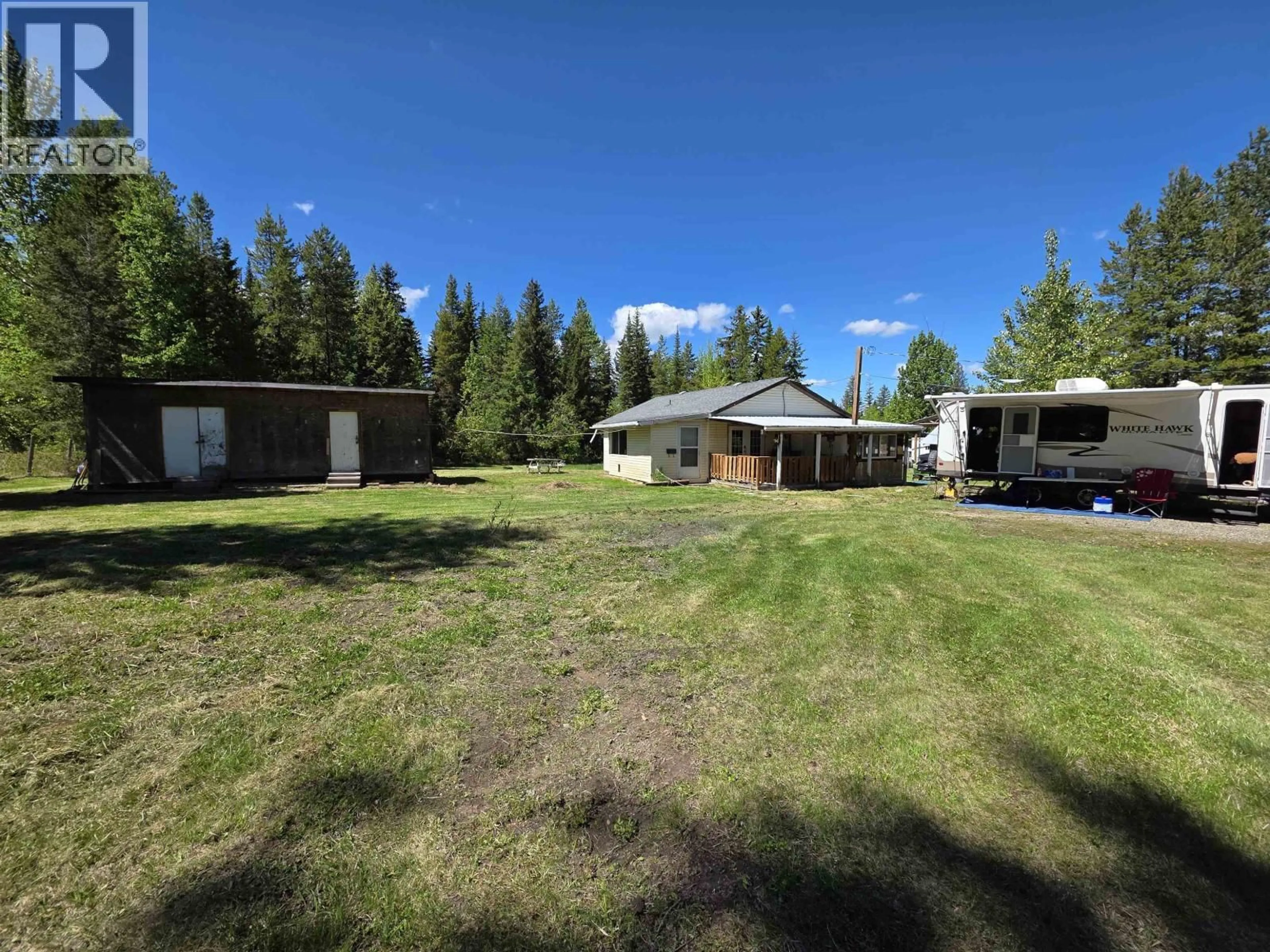 A pic from outside/outdoor area/front of a property/back of a property/a pic from drone, forest/trees view for 3949 SCHEMENAUR ROAD, Quesnel British Columbia V2J6V1