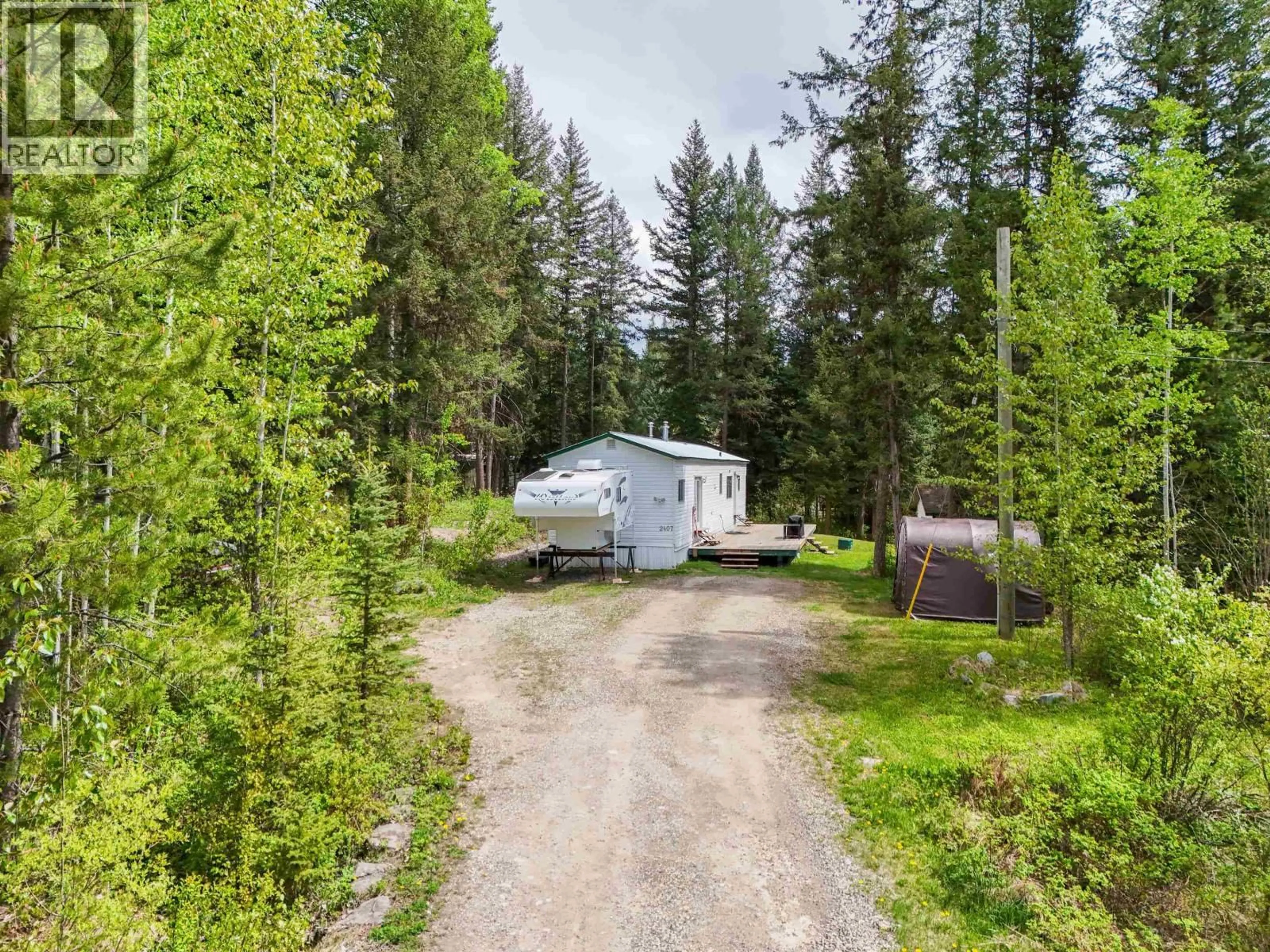 A pic from outside/outdoor area/front of a property/back of a property/a pic from drone, forest/trees view for 2407 VERNON ROAD, Quesnel British Columbia V2J7C8