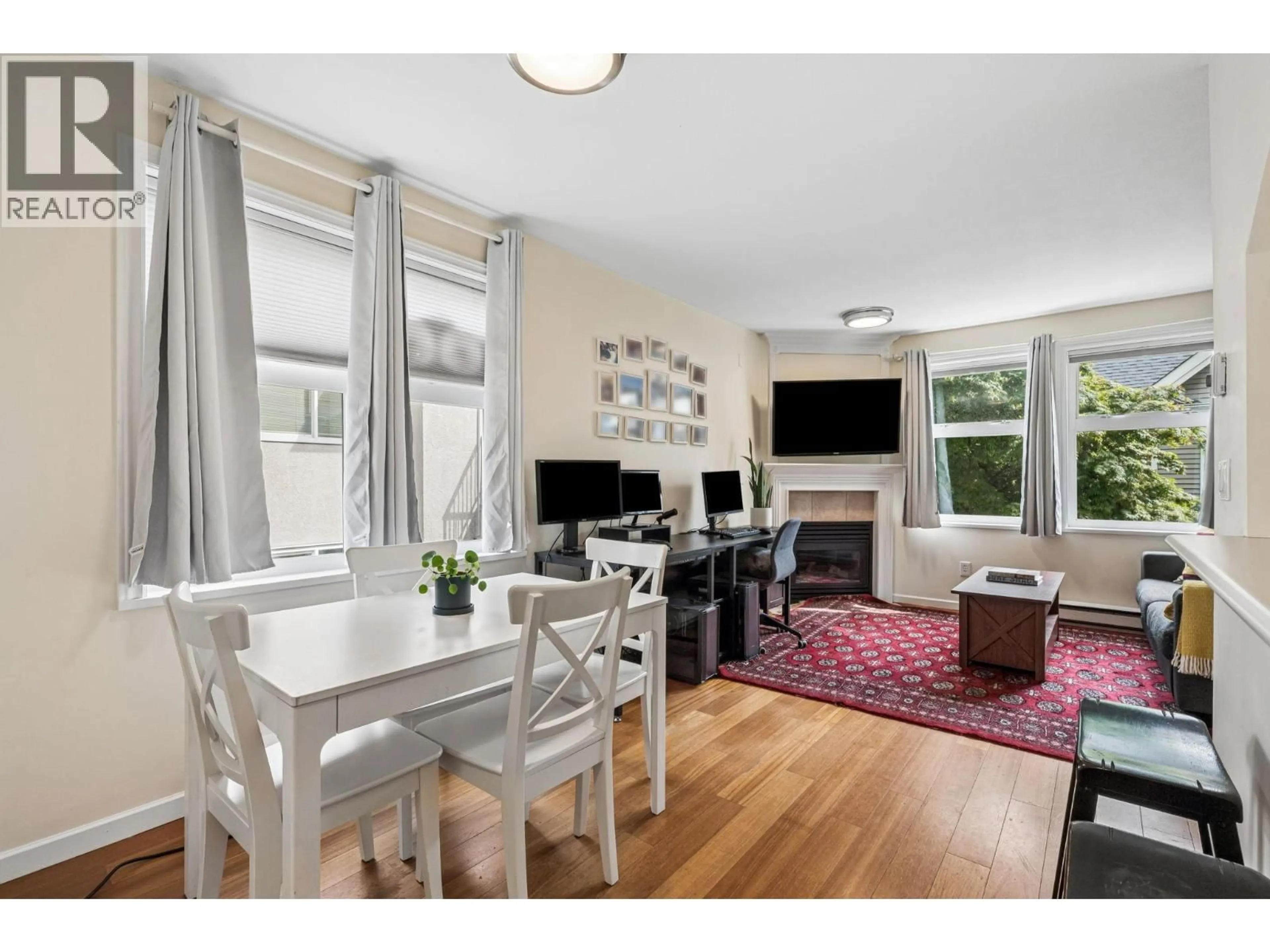Living room with furniture, wood/laminate floor for 206 - 2588 ALDER STREET, Vancouver British Columbia V6H4E5
