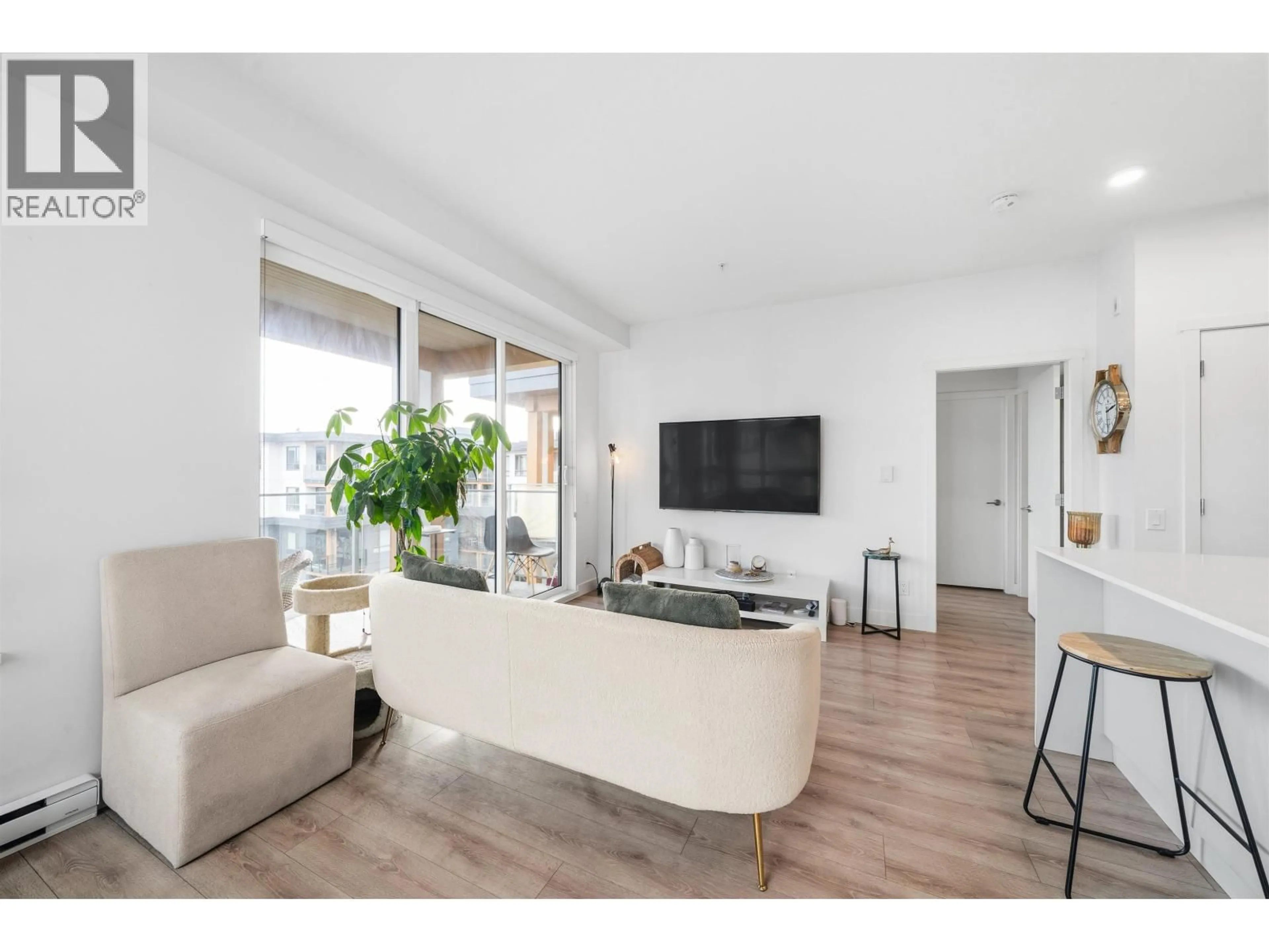 Living room with furniture, unknown for 613 - 735 ANSKAR COURT, Coquitlam British Columbia V3J0L7