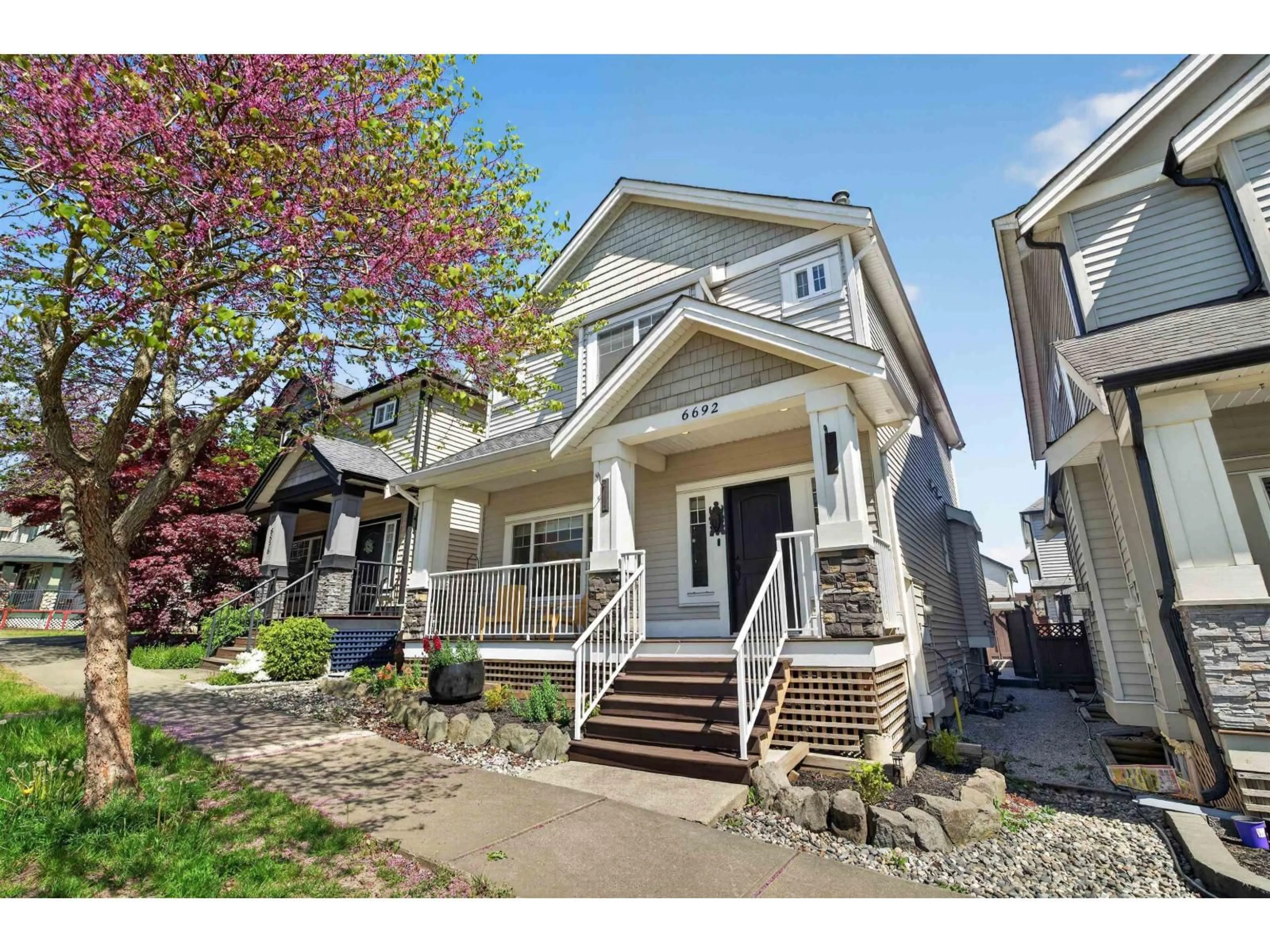 Home with vinyl exterior material, street for 6692 193A STREET, Surrey British Columbia V4N0C1
