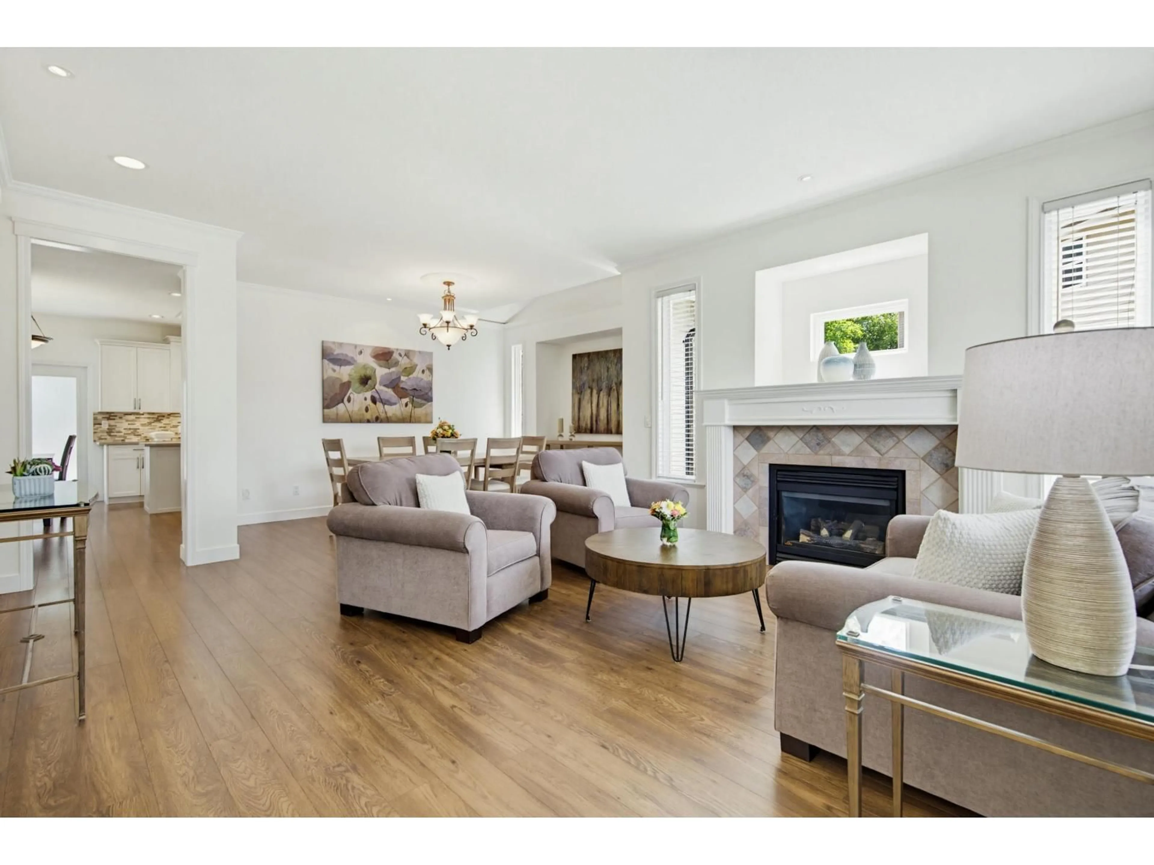 Living room with furniture, wood/laminate floor for 18158 68A AVENUE, Surrey British Columbia V3S9C2
