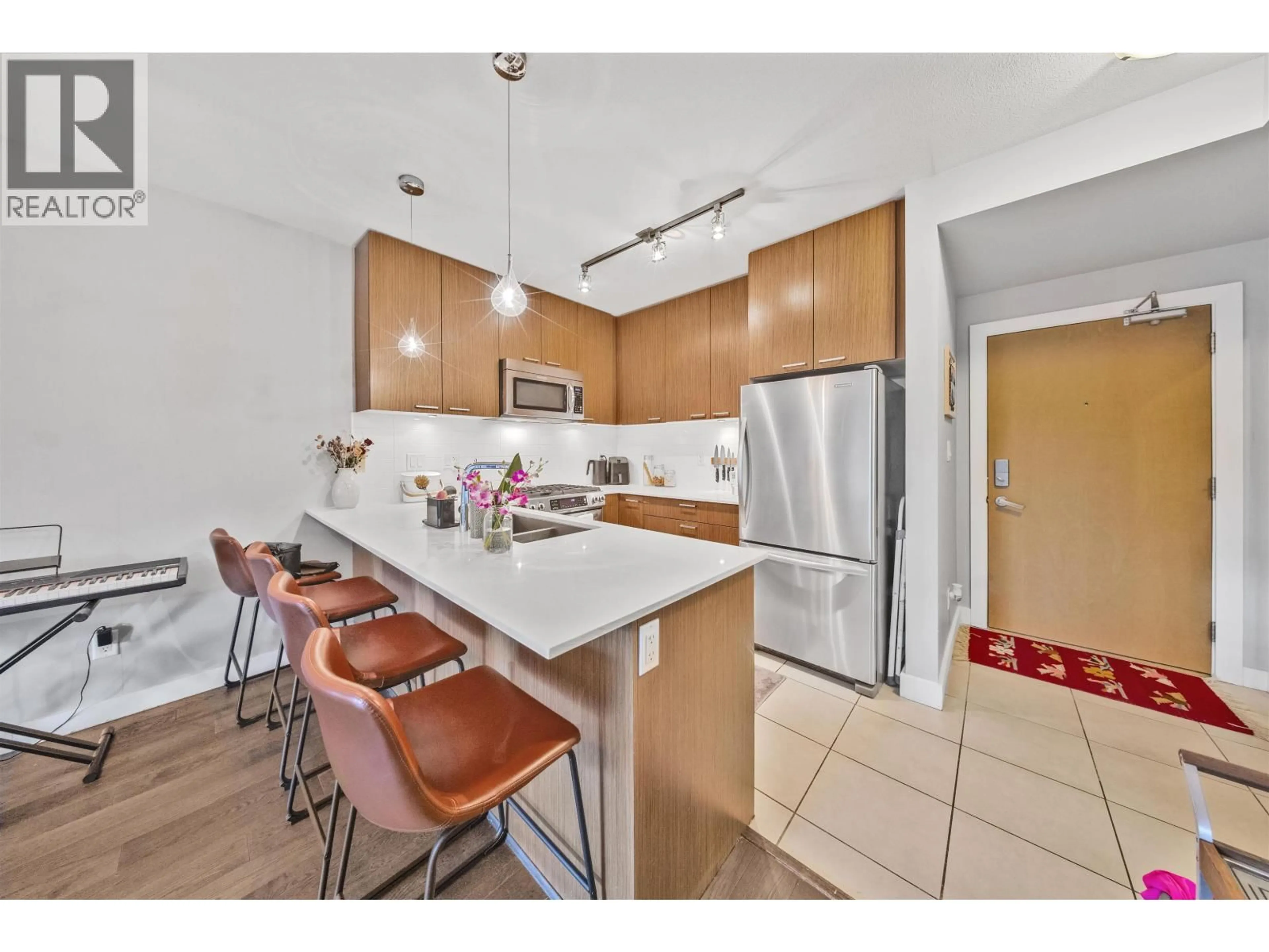 Open concept kitchen, unknown for 205 - 1330 MARINE DRIVE, North Vancouver British Columbia V7P1T4