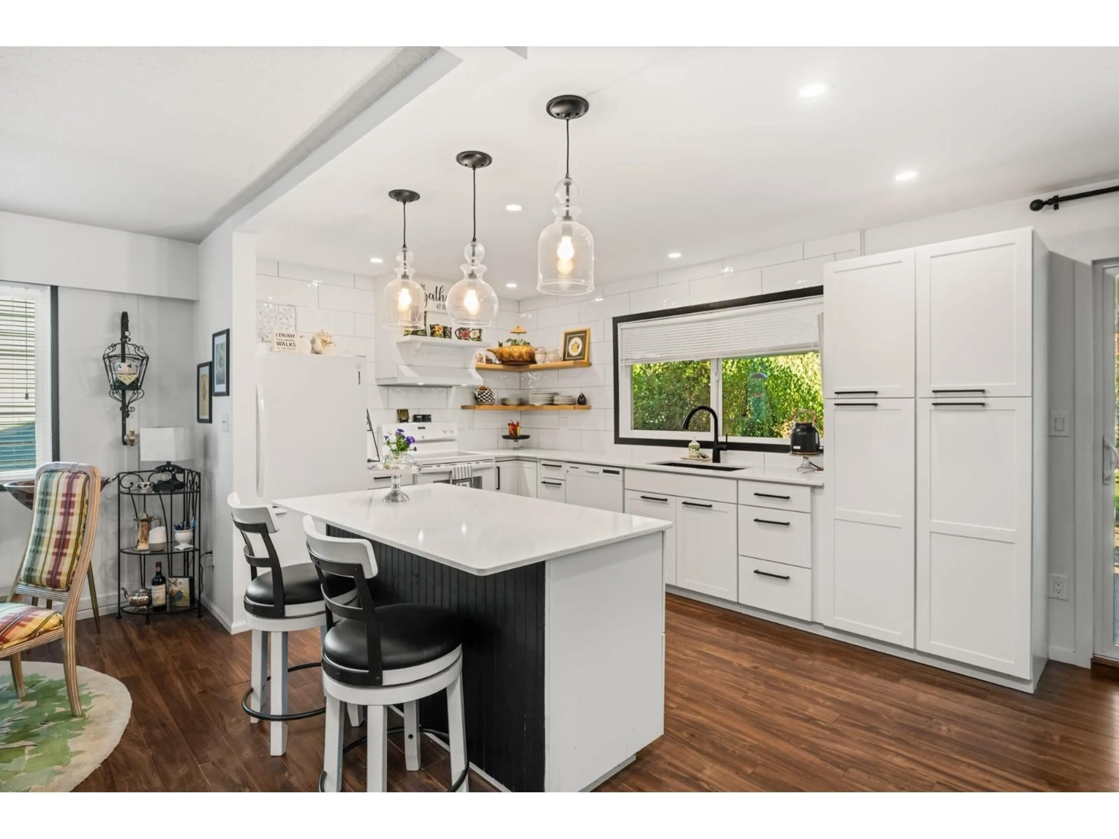 Open concept kitchen, wood/laminate floor for 20553 43A AVENUE, Langley British Columbia V3A3C7