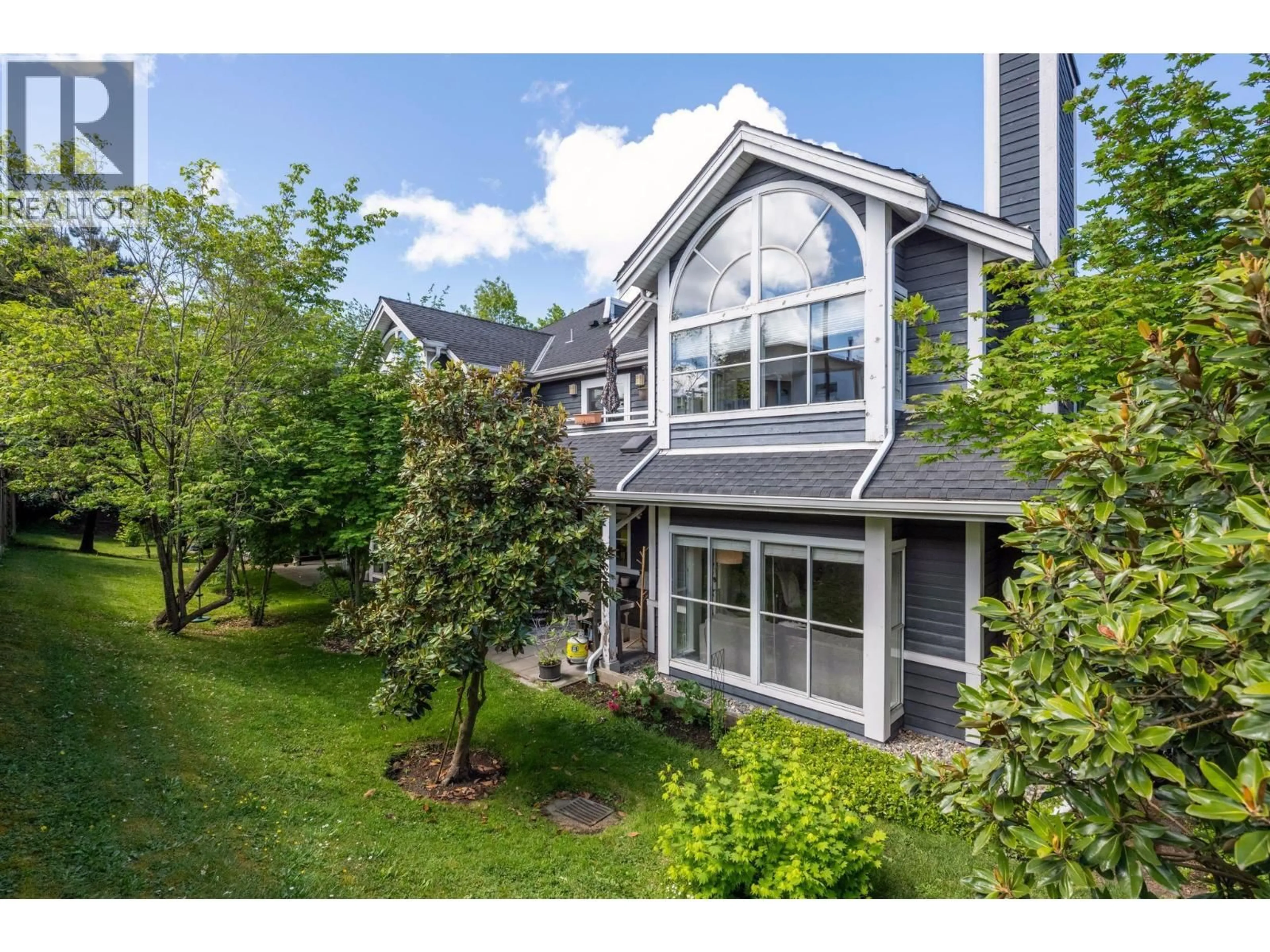 A pic from outside/outdoor area/front of a property/back of a property/a pic from drone, unknown for 111 - 2960 29TH AVENUE, Vancouver British Columbia V5R5Z5