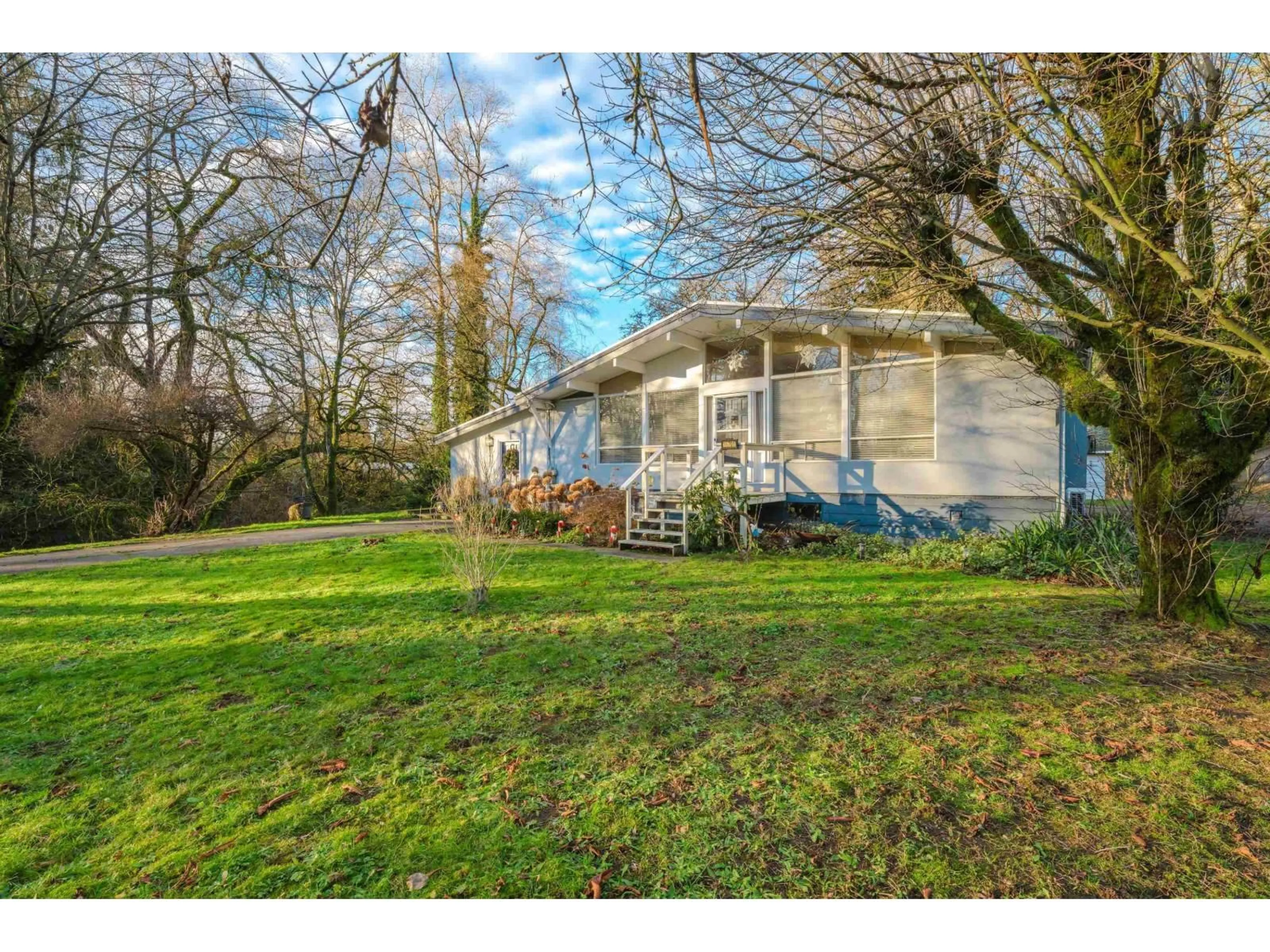 A pic from outside/outdoor area/front of a property/back of a property/a pic from drone, street for 18701 88 AVENUE, Surrey British Columbia V4N5T1