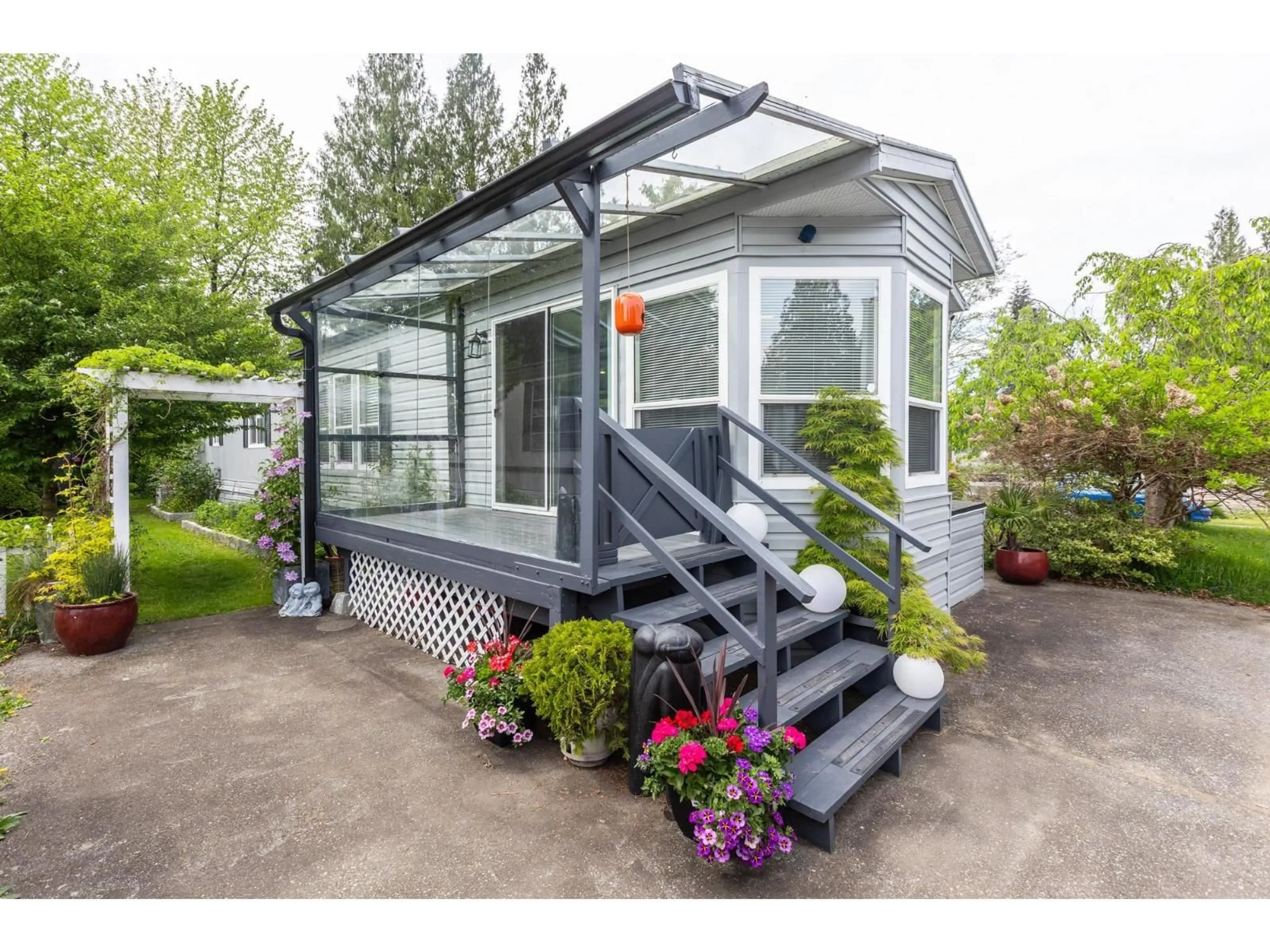 Home with vinyl exterior material, street for 4 - 23387 70A AVENUE, Langley British Columbia V2Y2J2