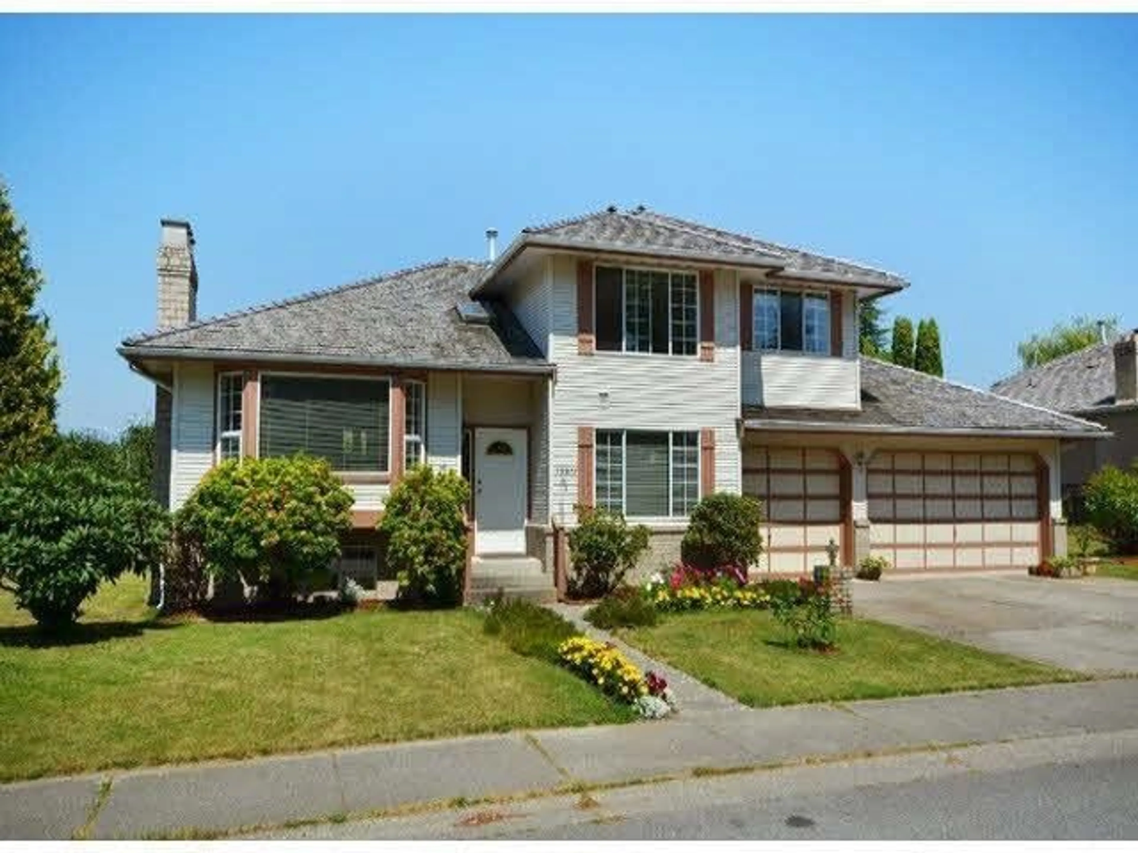 Home with vinyl exterior material, street for 15911 111 AVENUE, Surrey British Columbia V4N1C8