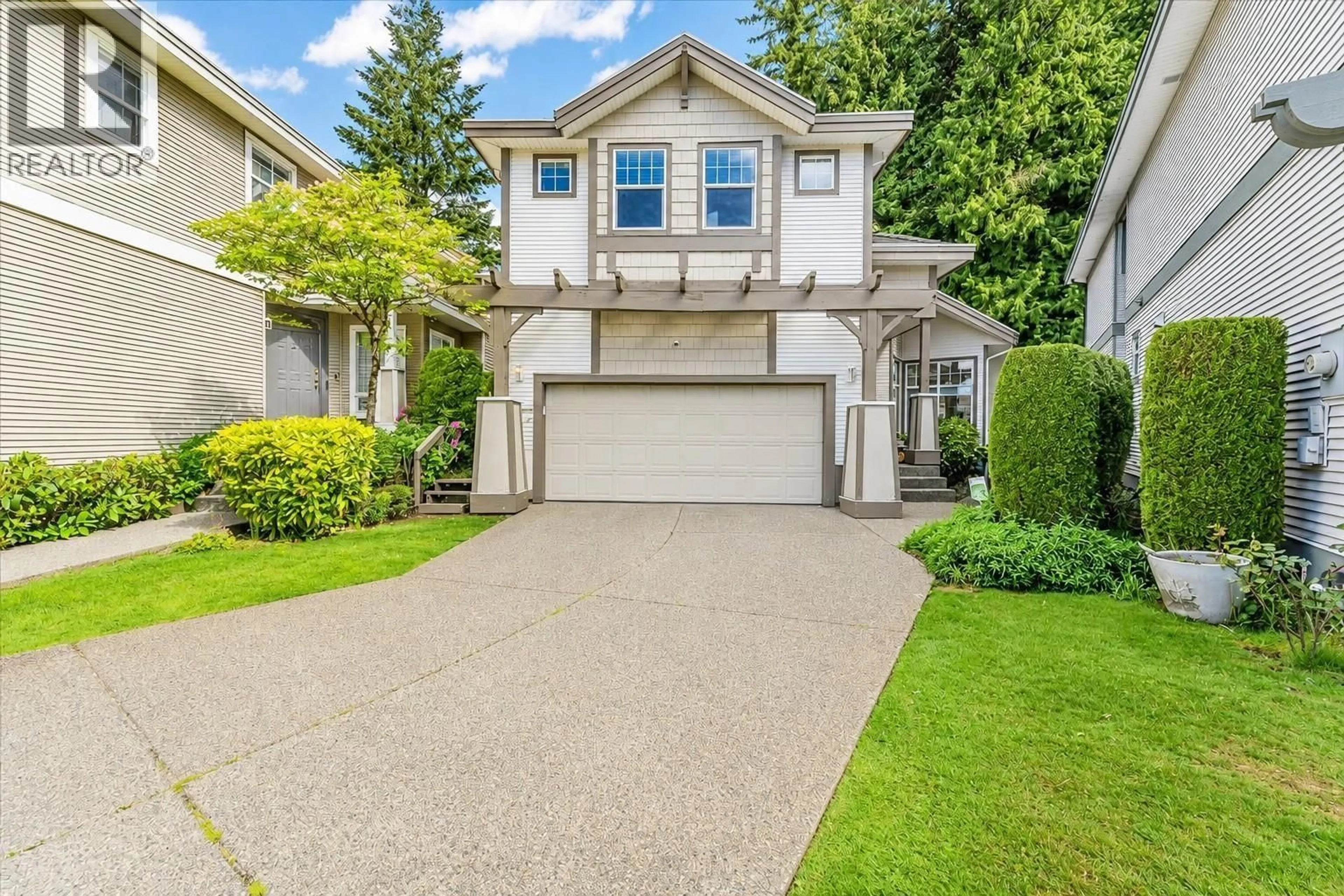 Home with vinyl exterior material, street for 1705 ARBUTUS PLACE, Coquitlam British Columbia V3E3K2