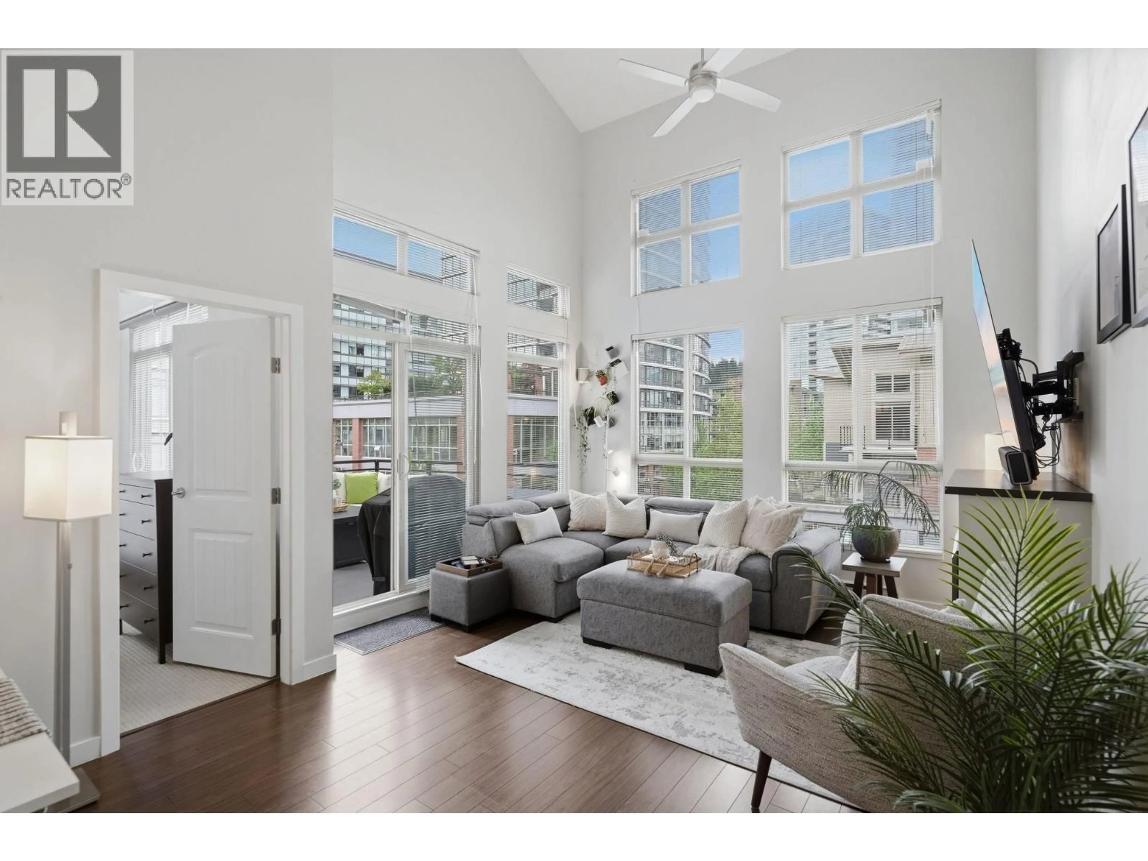 Living room with furniture, unknown for 421 - 101 MORRISSEY ROAD, Port Moody British Columbia V3H0E6