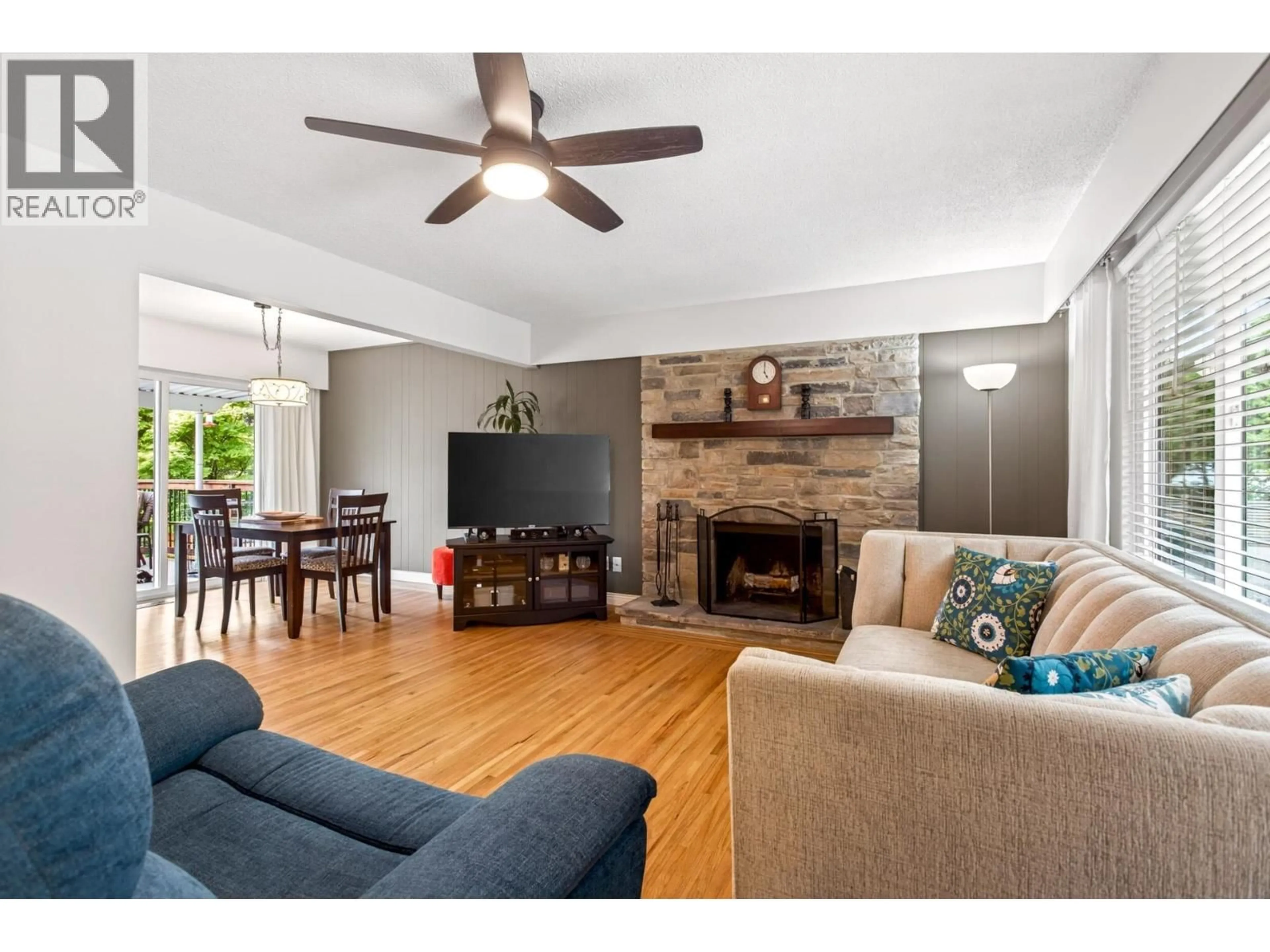 Living room with furniture, wood/laminate floor for 5240 SPROTT STREET, Burnaby British Columbia V5G1T5