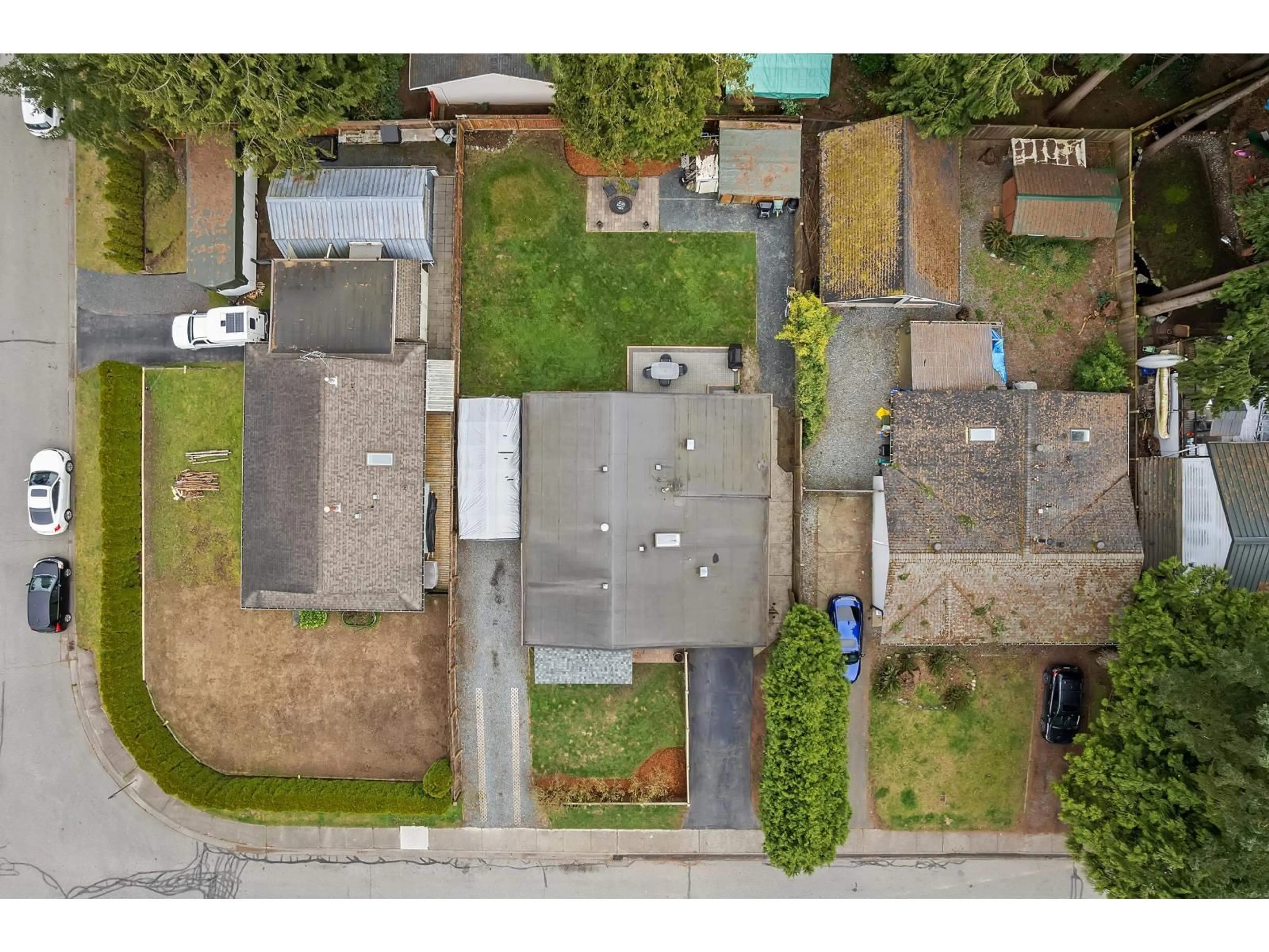 A pic from outside/outdoor area/front of a property/back of a property/a pic from drone, street for 4552 200A STREET, Langley British Columbia V3A6J7