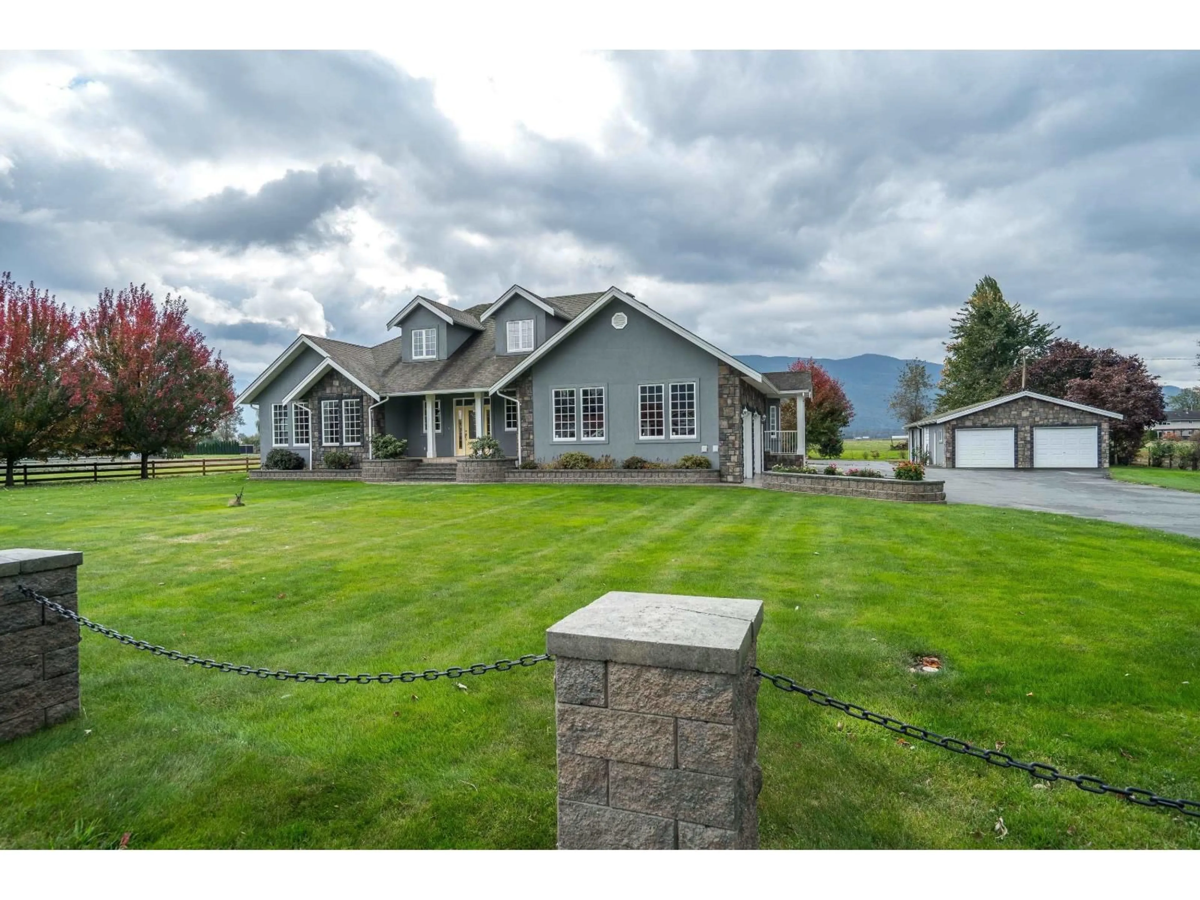 A pic from outside/outdoor area/front of a property/back of a property/a pic from drone, mountain view for 42872 SOUTH SUMAS ROAD, Chilliwack British Columbia V2R4L7
