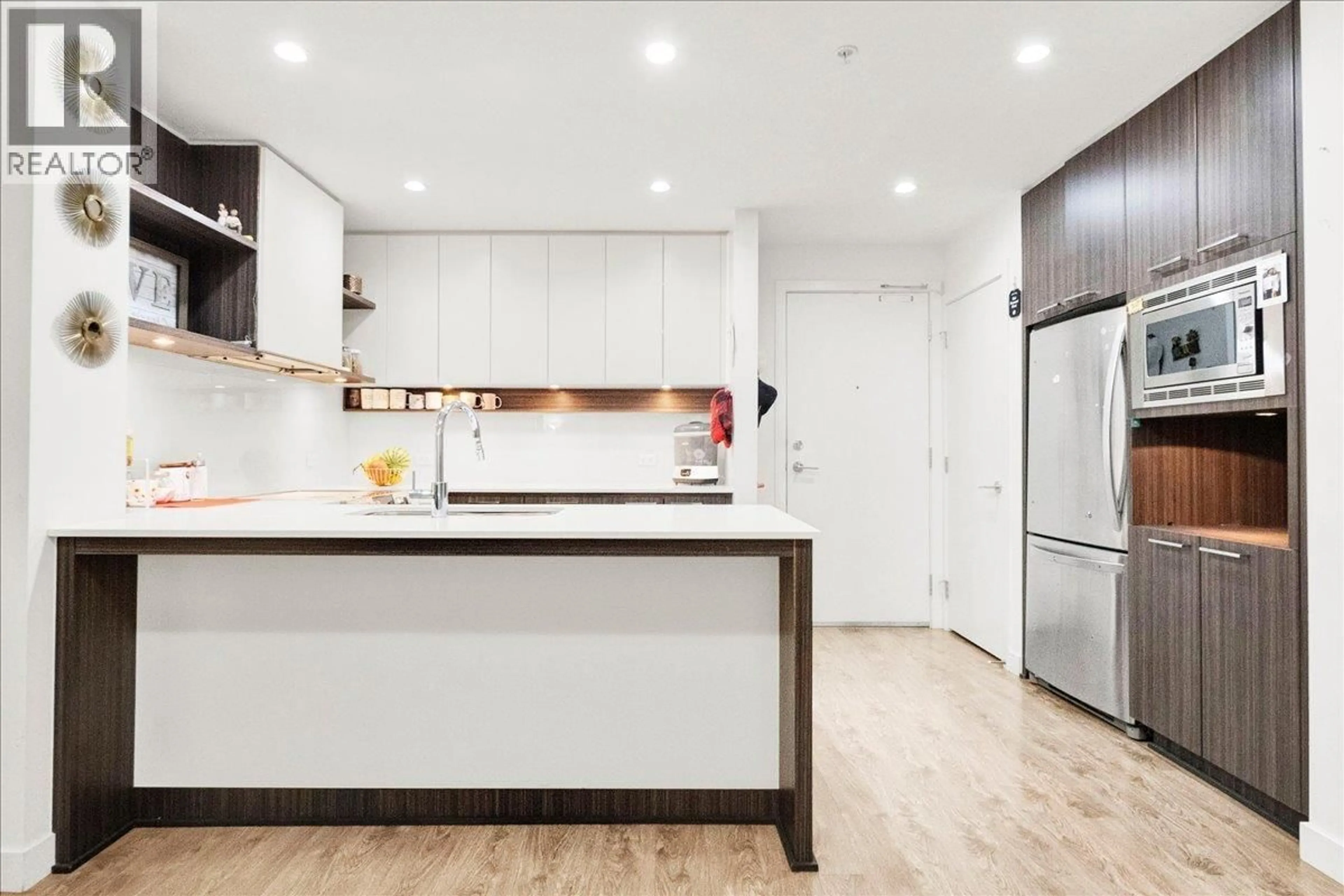 Contemporary kitchen, wood/laminate floor for 218 - 9250 UNIVERSITY HIGH STREET, Burnaby British Columbia V5A0B3