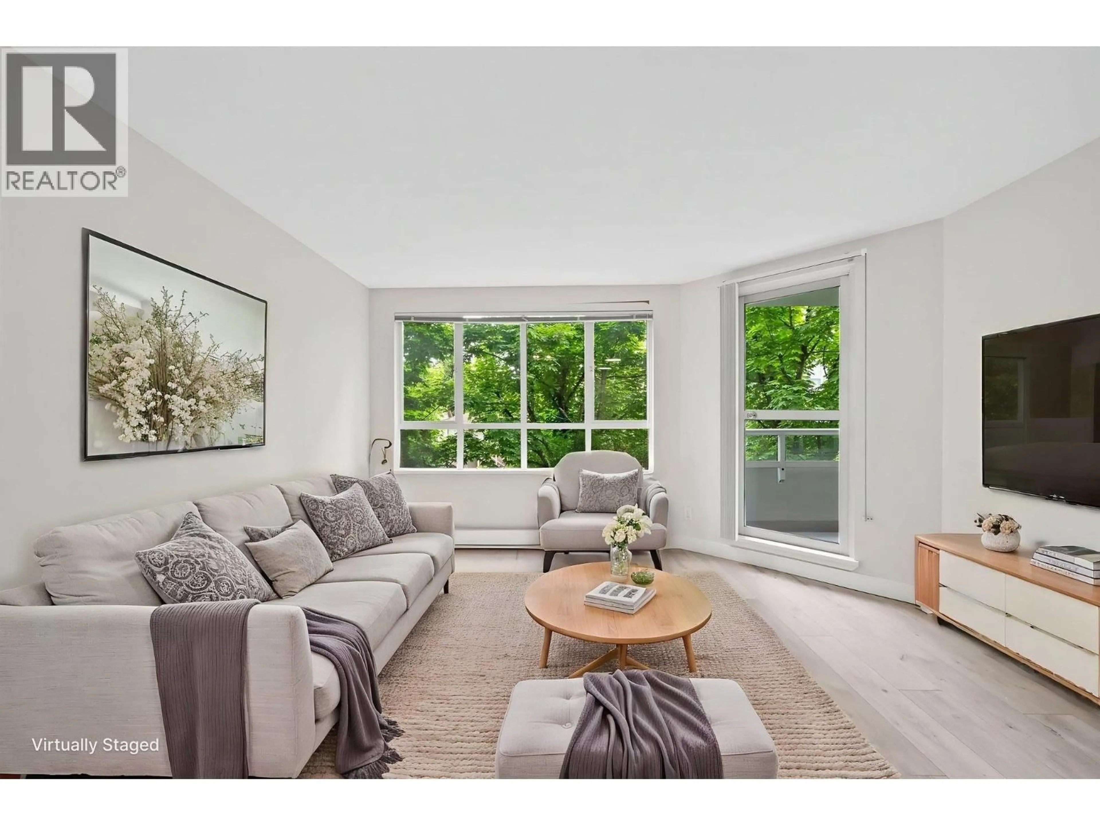 Living room with furniture, unknown for 311 - 3489 ASCOT PLACE, Vancouver British Columbia V5R6B6