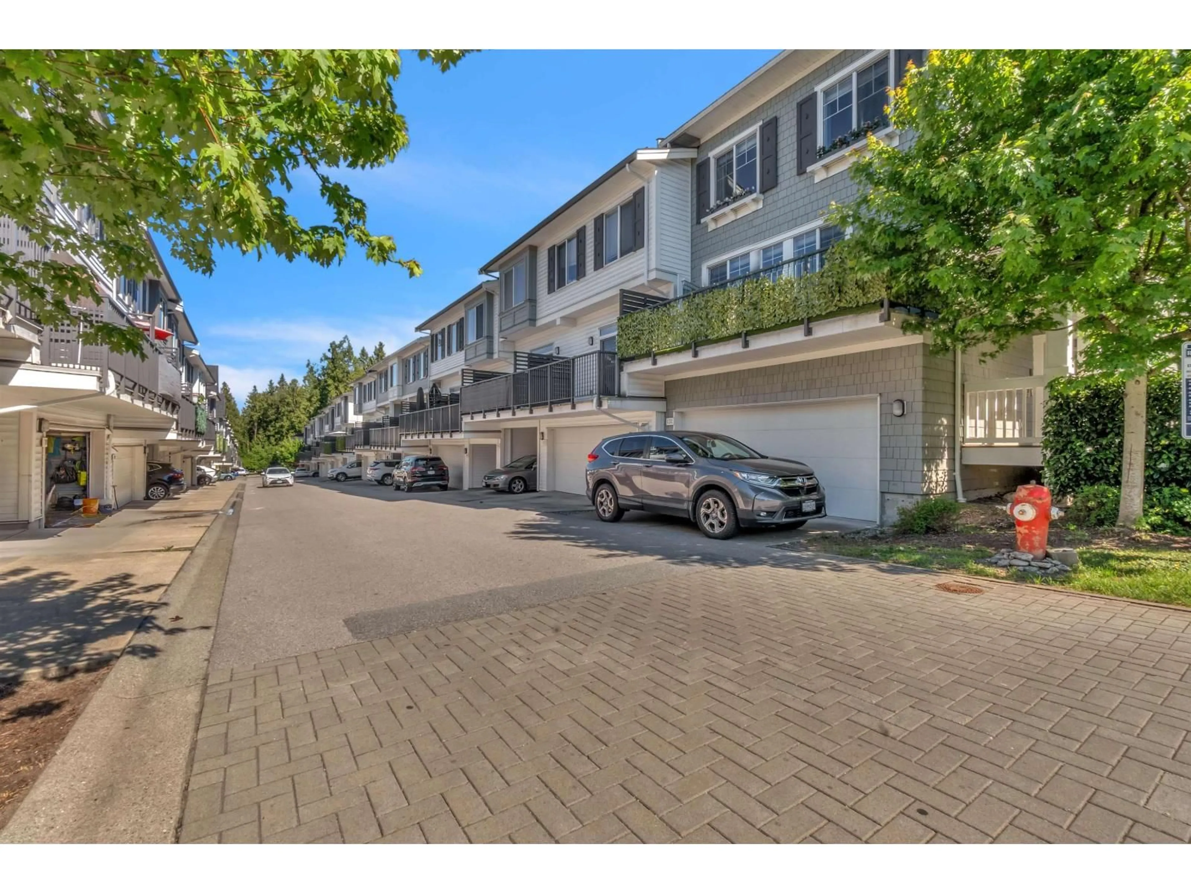 A pic from outside/outdoor area/front of a property/back of a property/a pic from drone, street for 130 - 8130 136A STREET, Surrey British Columbia V3W1H9