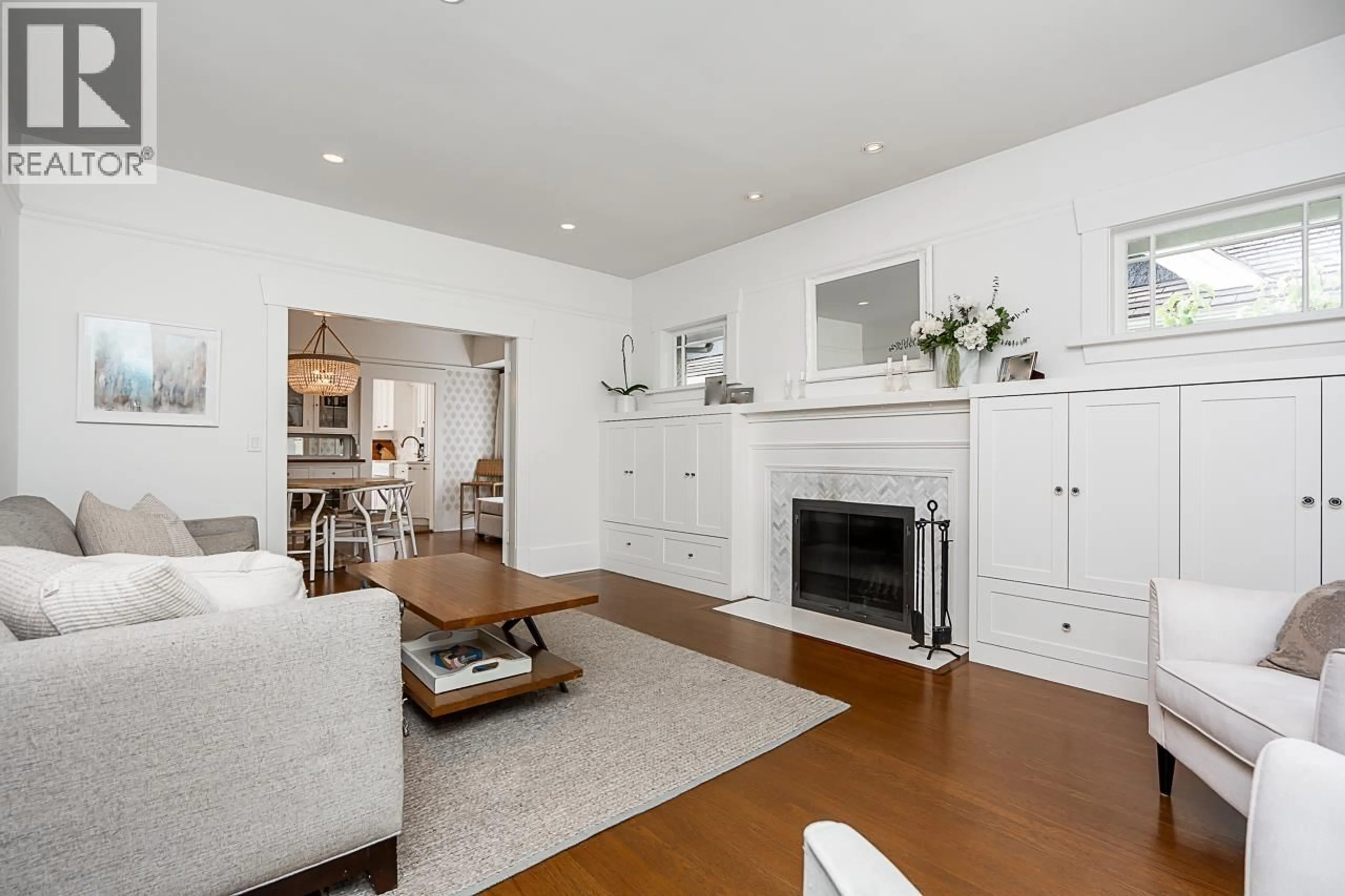 Living room with furniture, wood/laminate floor for 2230 WATERLOO STREET, Vancouver British Columbia V6R3H3