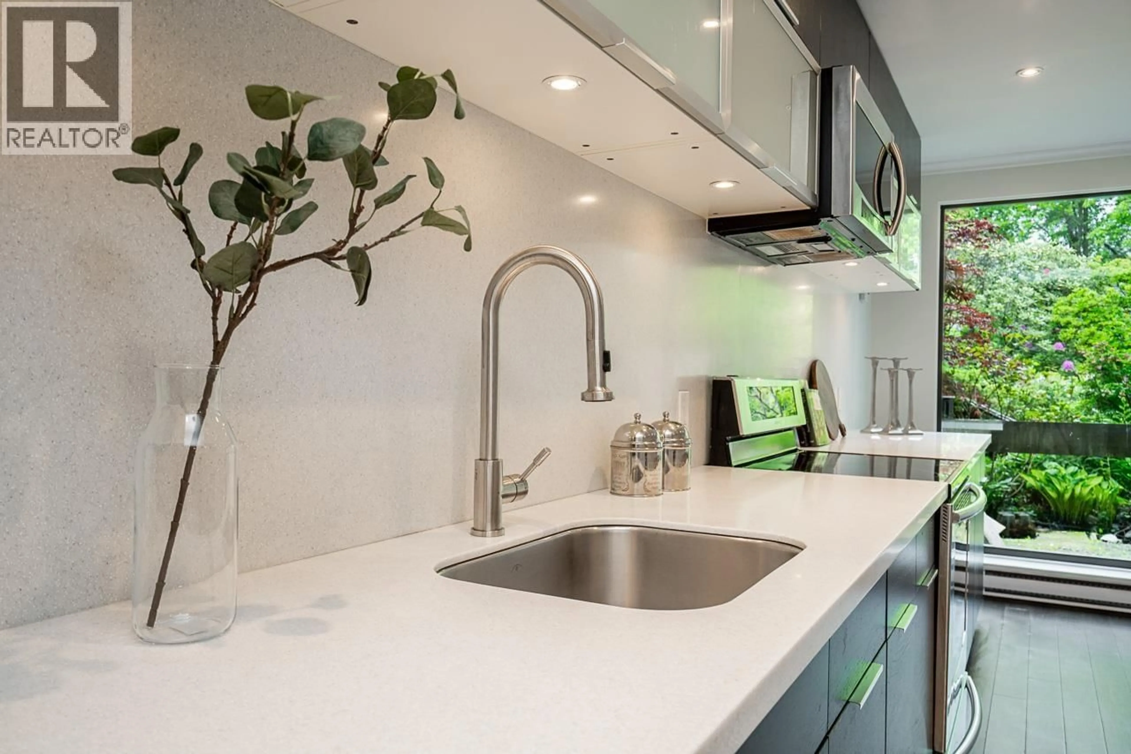 Contemporary kitchen, ceramic/tile floor for 697 MOBERLY ROAD, Vancouver British Columbia V5V4A4