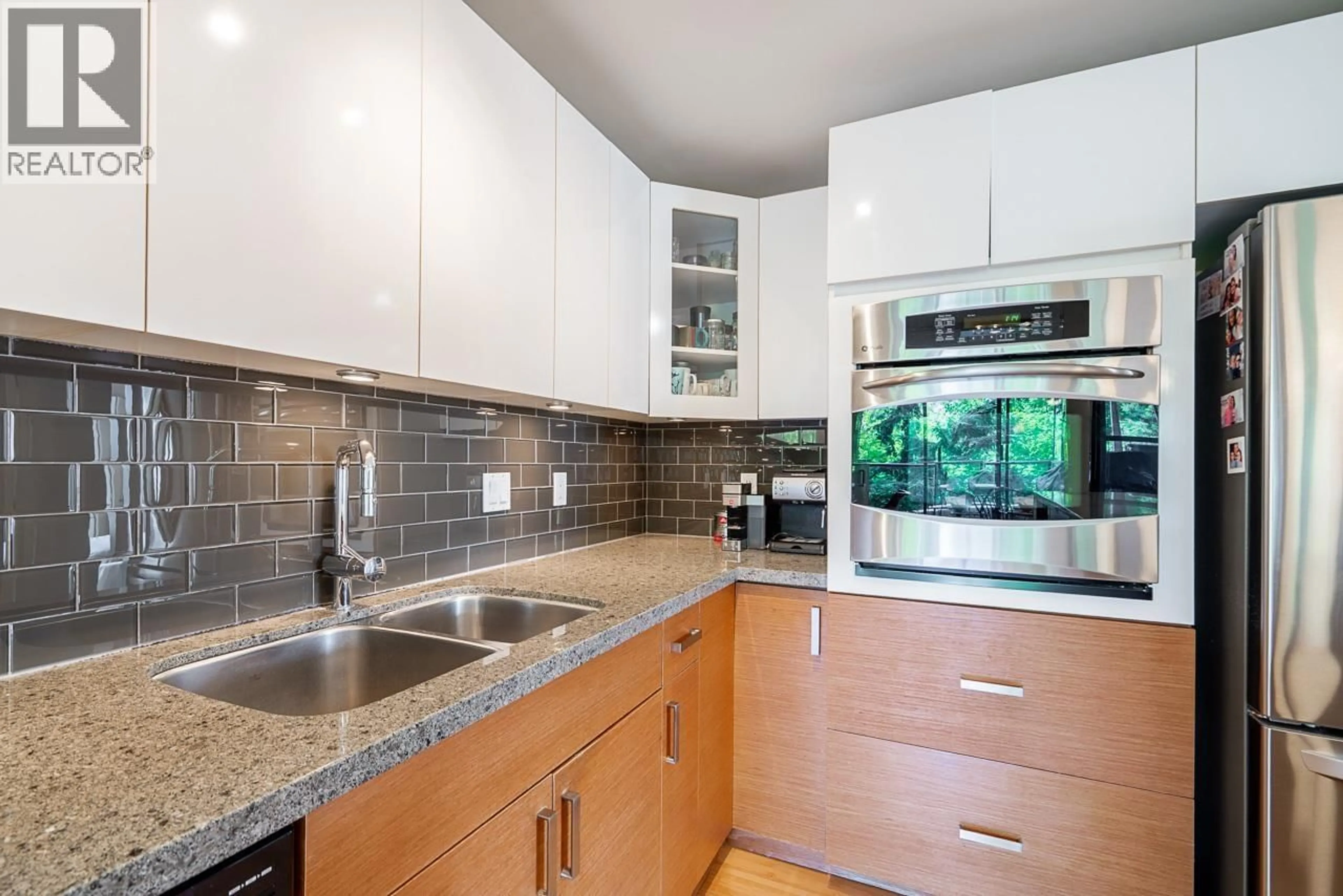 Standard kitchen, ceramic/tile floor for 301 - 1450 PENNYFARTHING DRIVE, Vancouver British Columbia V6J4X8