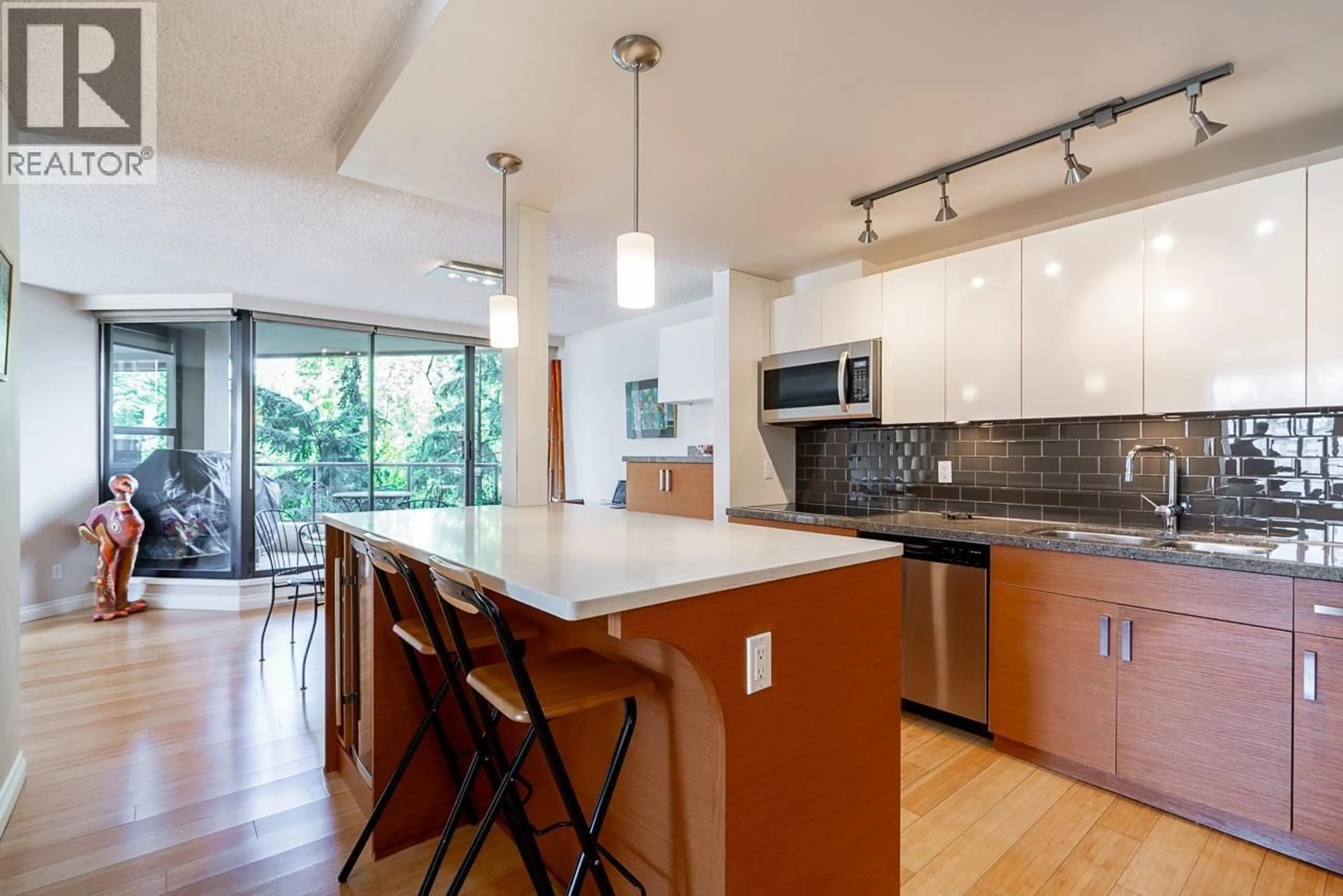 Open concept kitchen, unknown for 301 - 1450 PENNYFARTHING DRIVE, Vancouver British Columbia V6J4X8