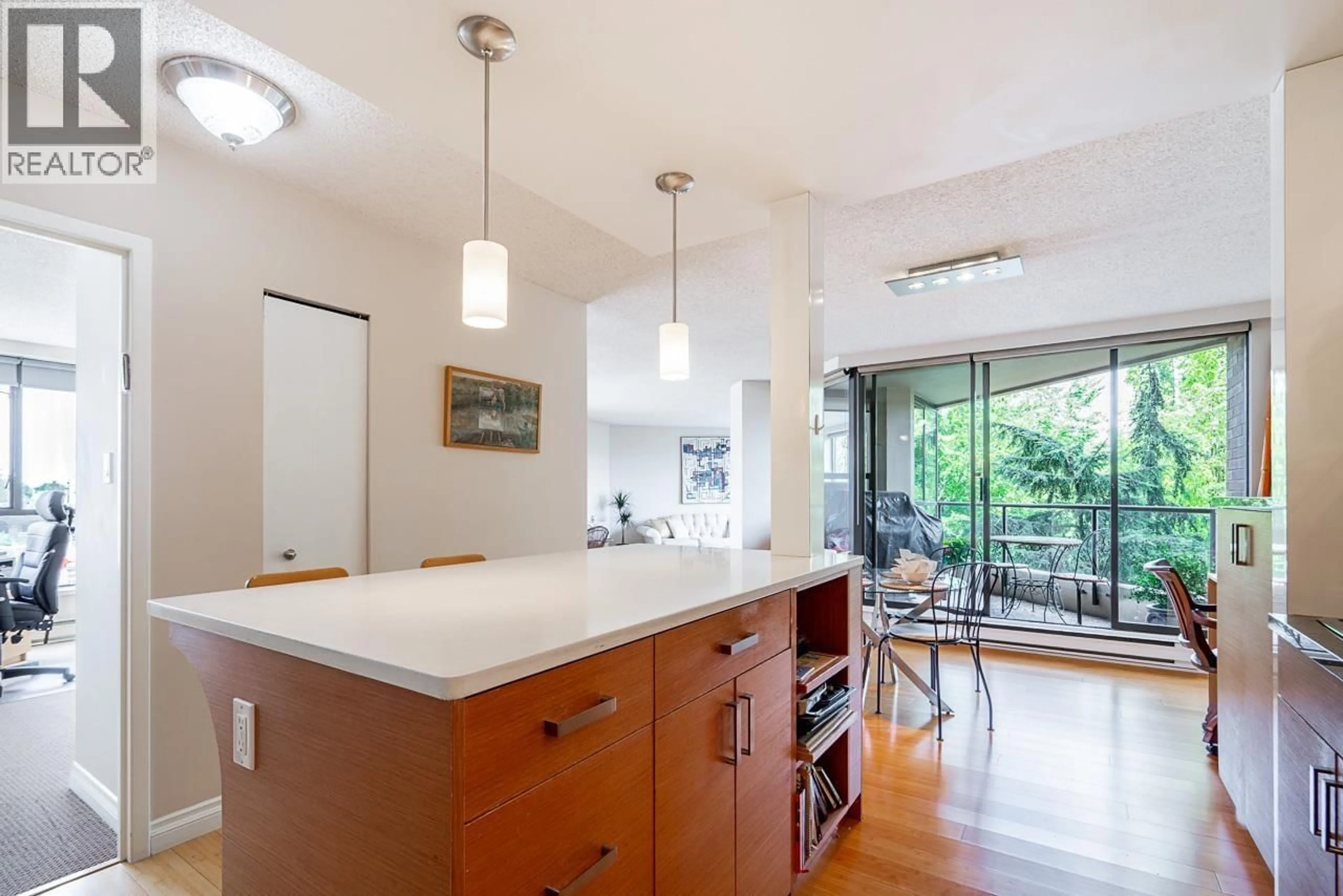 Open concept kitchen, unknown for 301 - 1450 PENNYFARTHING DRIVE, Vancouver British Columbia V6J4X8
