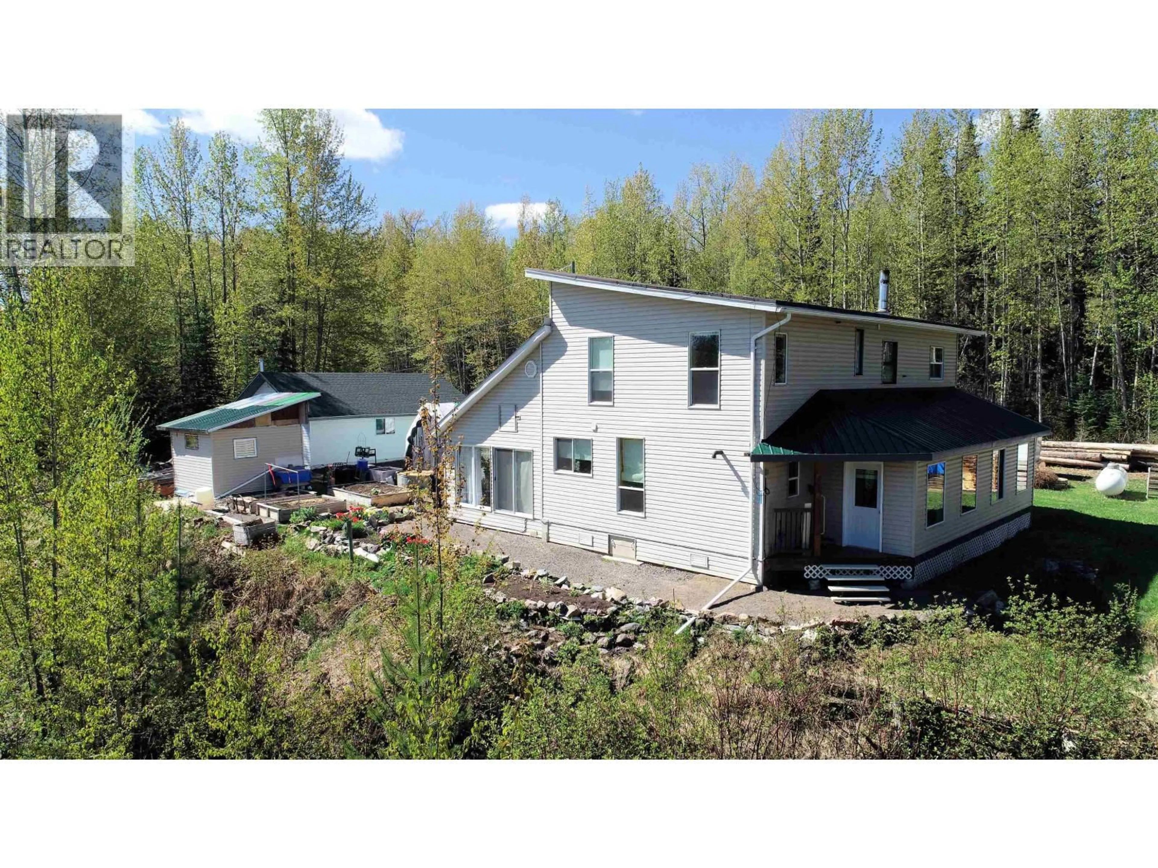 A pic from outside/outdoor area/front of a property/back of a property/a pic from drone, building for 34 WILKENSON AVENUE, Granisle British Columbia V0J1W0