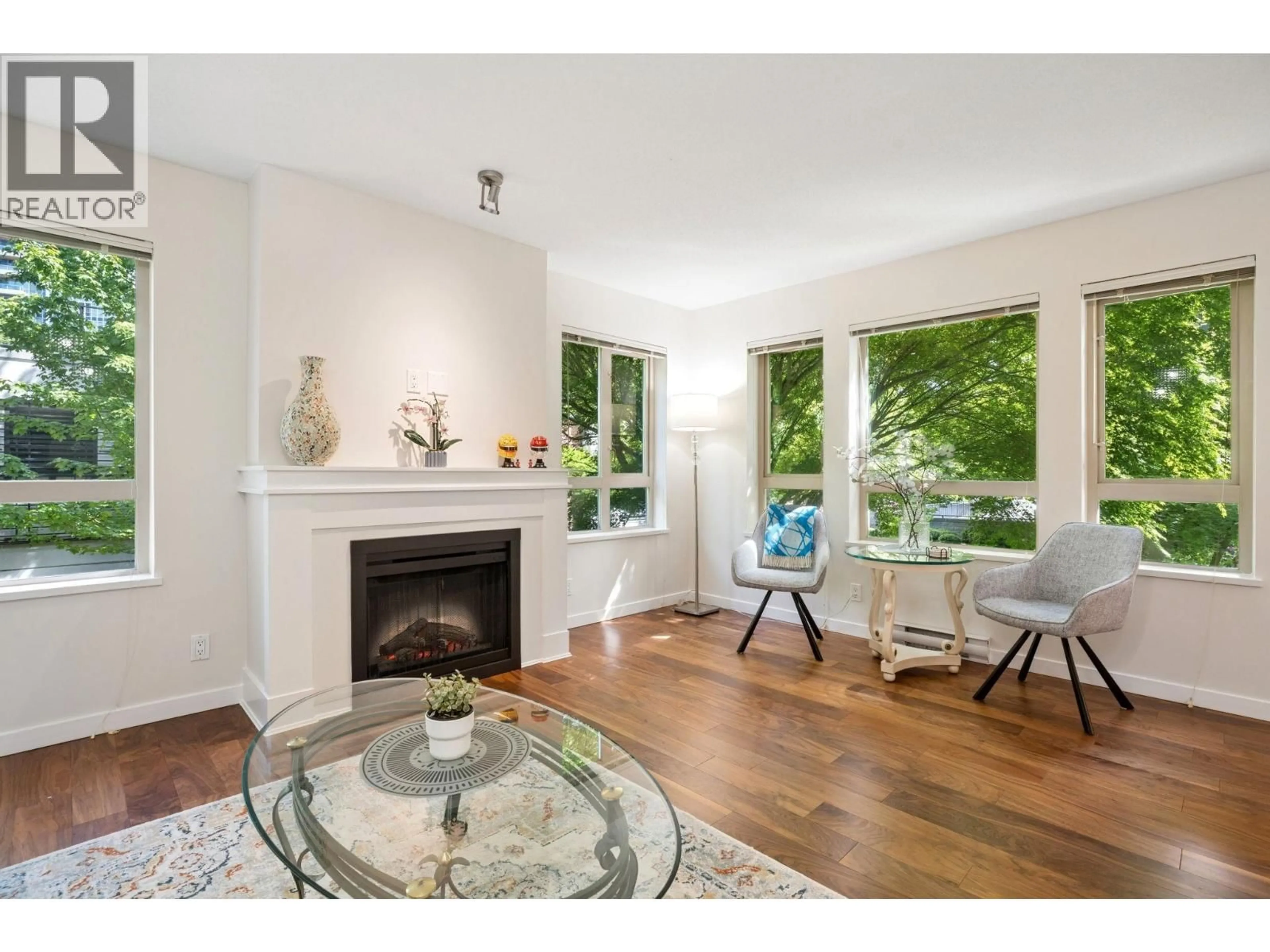 Living room with furniture, wood/laminate floor for 206 - 3097 LINCOLN AVENUE, Coquitlam British Columbia V3B0E3