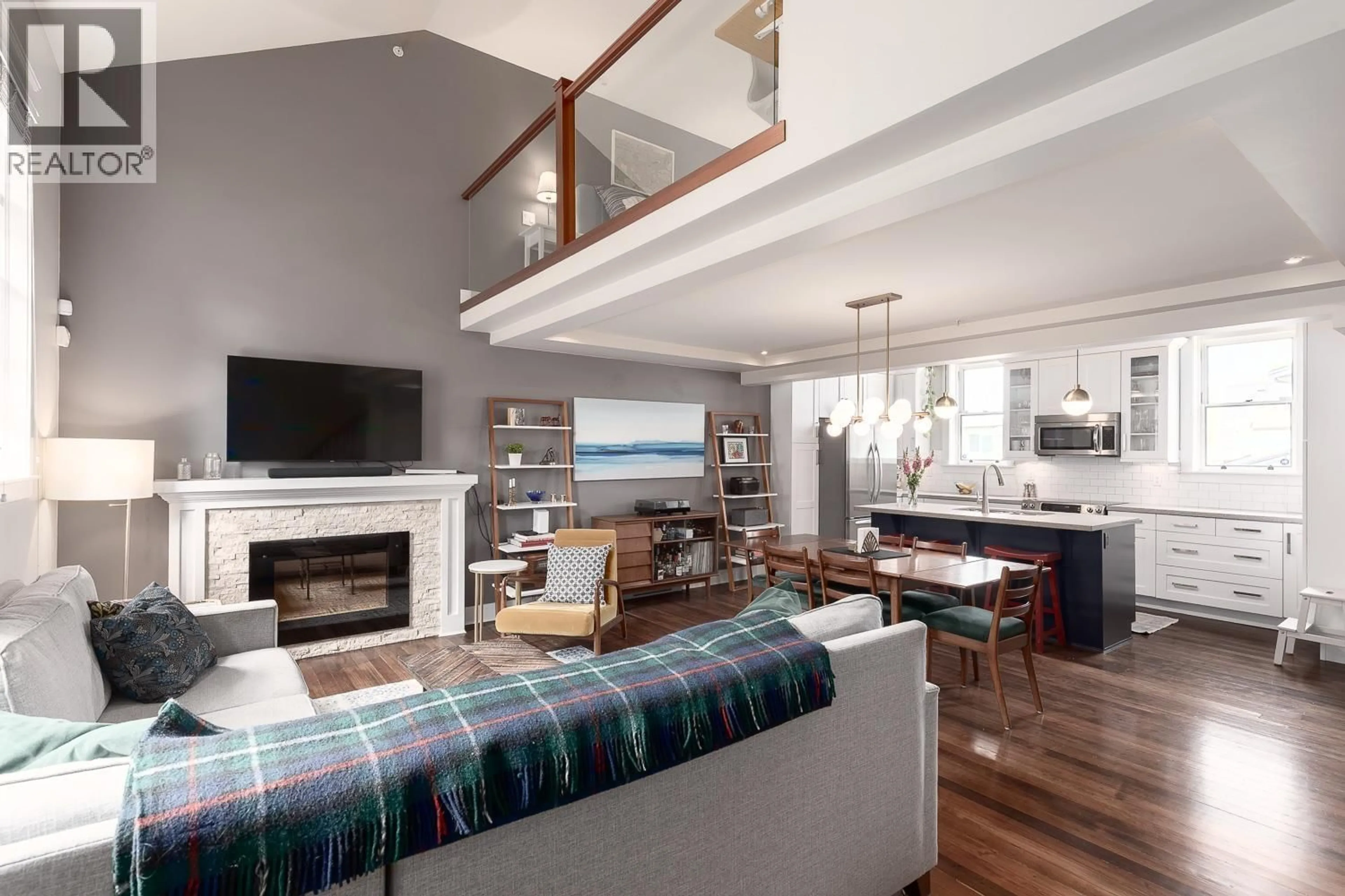 Living room with furniture, wood/laminate floor for 1077 SALSBURY DRIVE, Vancouver British Columbia V5L4A6