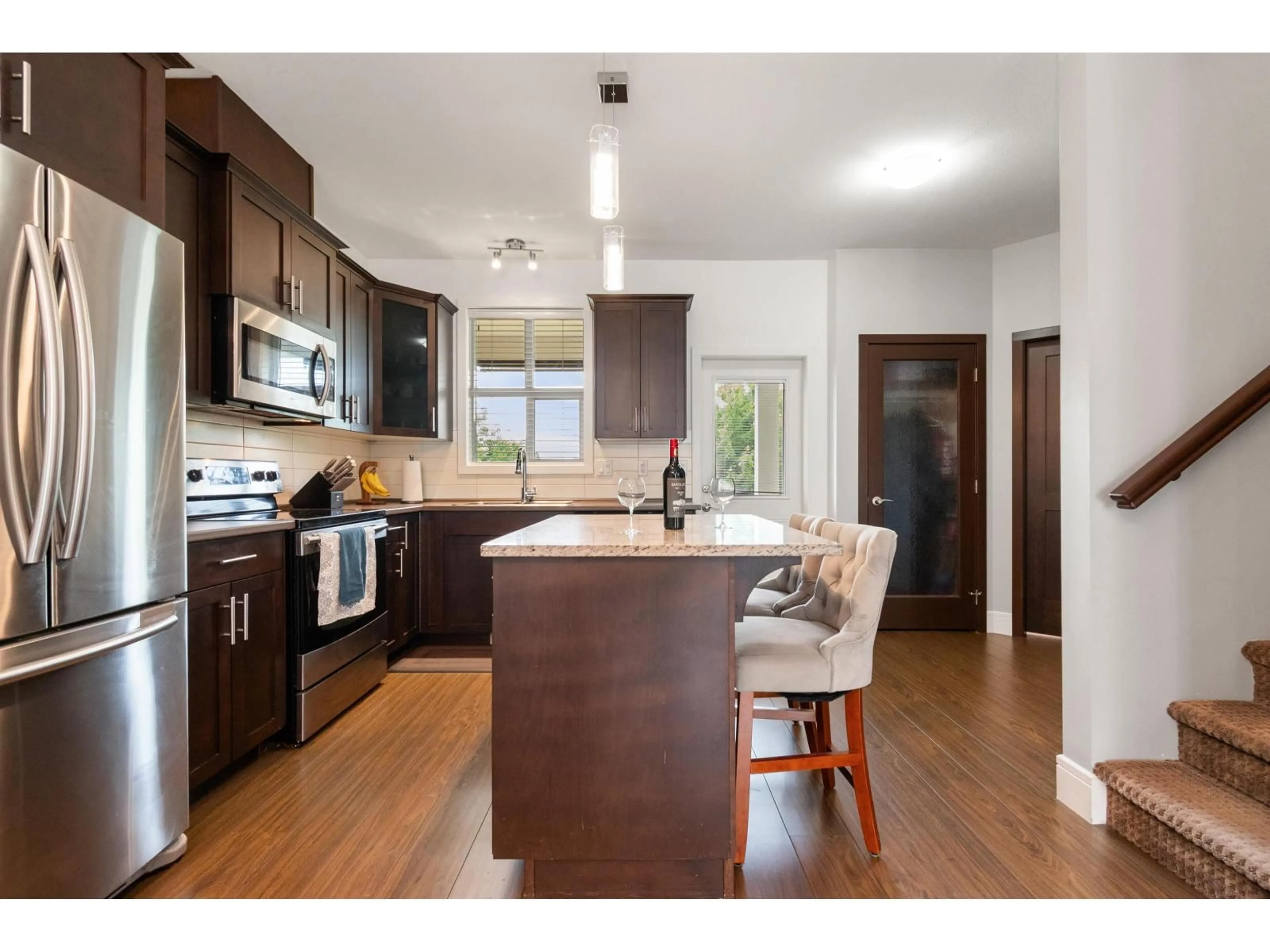 Open concept kitchen, wood/laminate floor for 18 - 44420 SHERRY DRIVE, Chilliwack British Columbia V2R0R6