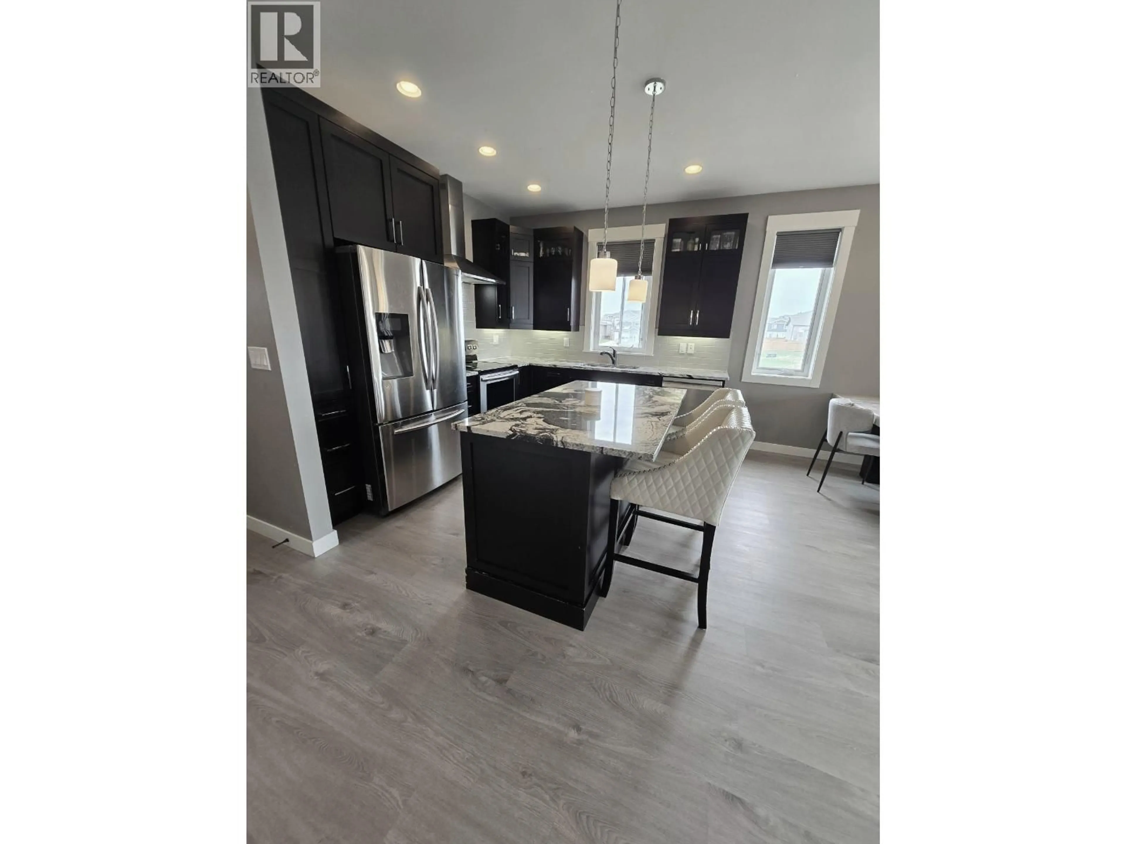 Open concept kitchen, unknown for 10303 115 AVENUE, Fort St. John British Columbia V1J0P8