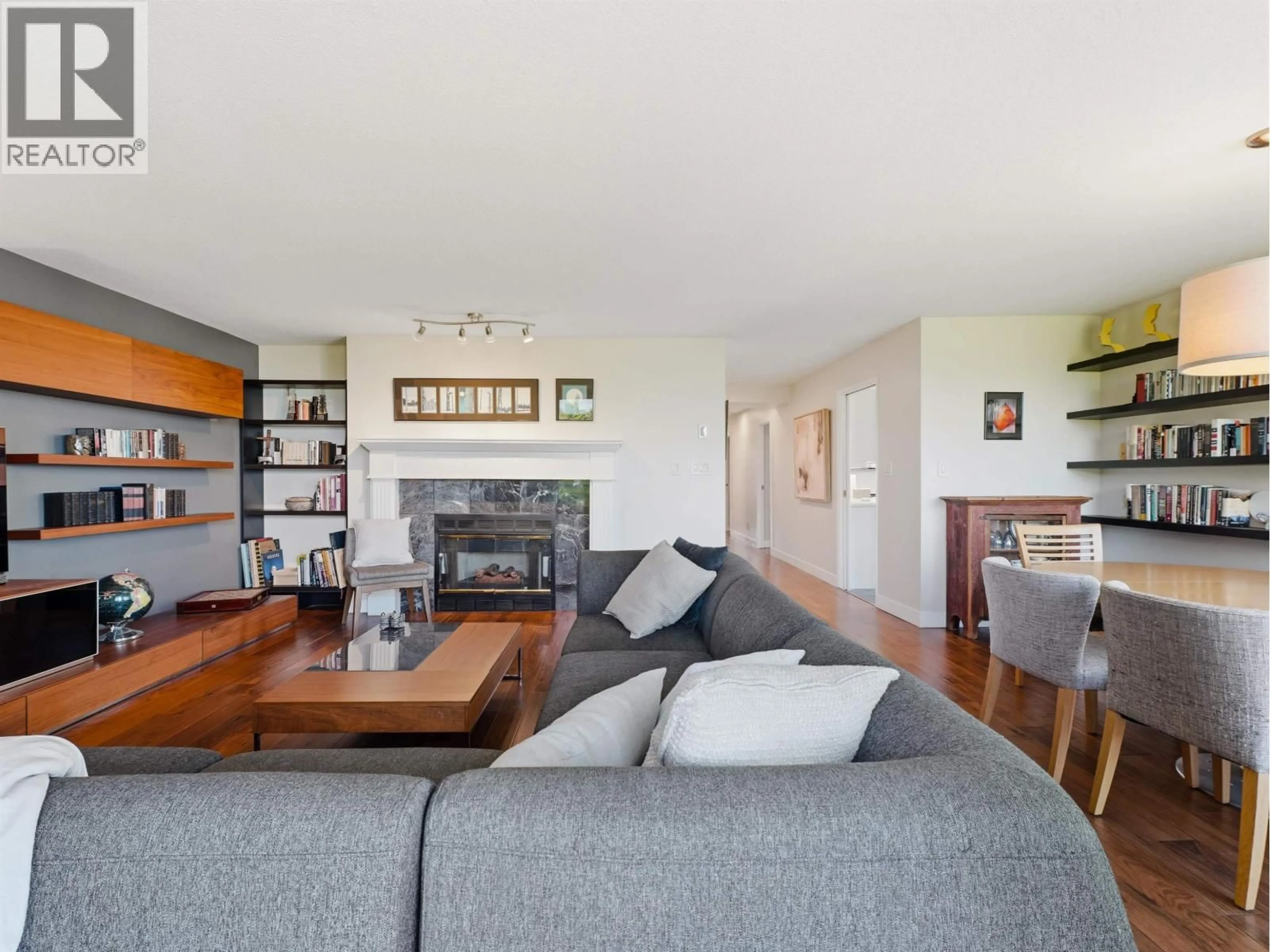 Living room with furniture, wood/laminate floor for 901 - 1566 13TH AVENUE, Vancouver British Columbia V6J2G4
