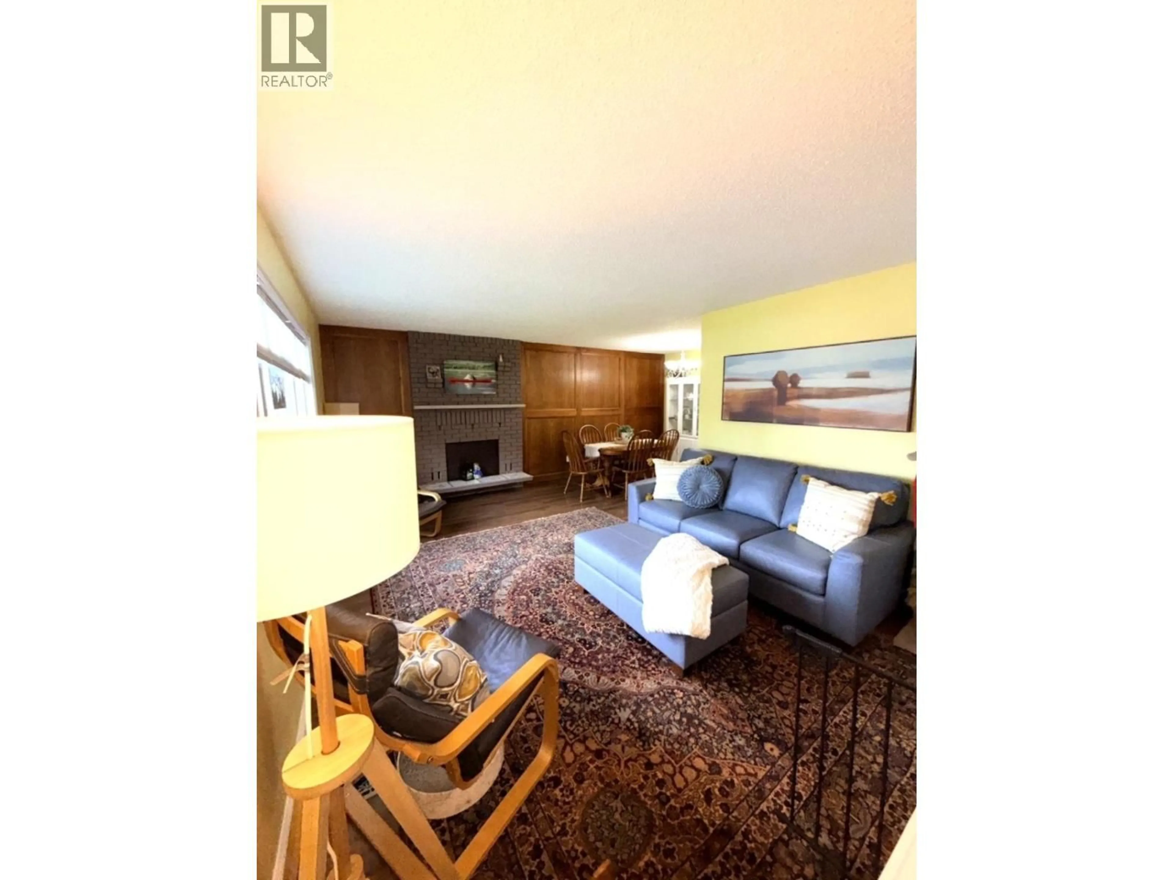 Living room with furniture, wood/laminate floor for 7864 LOYOLA CRESCENT, Prince George British Columbia V2M3V2
