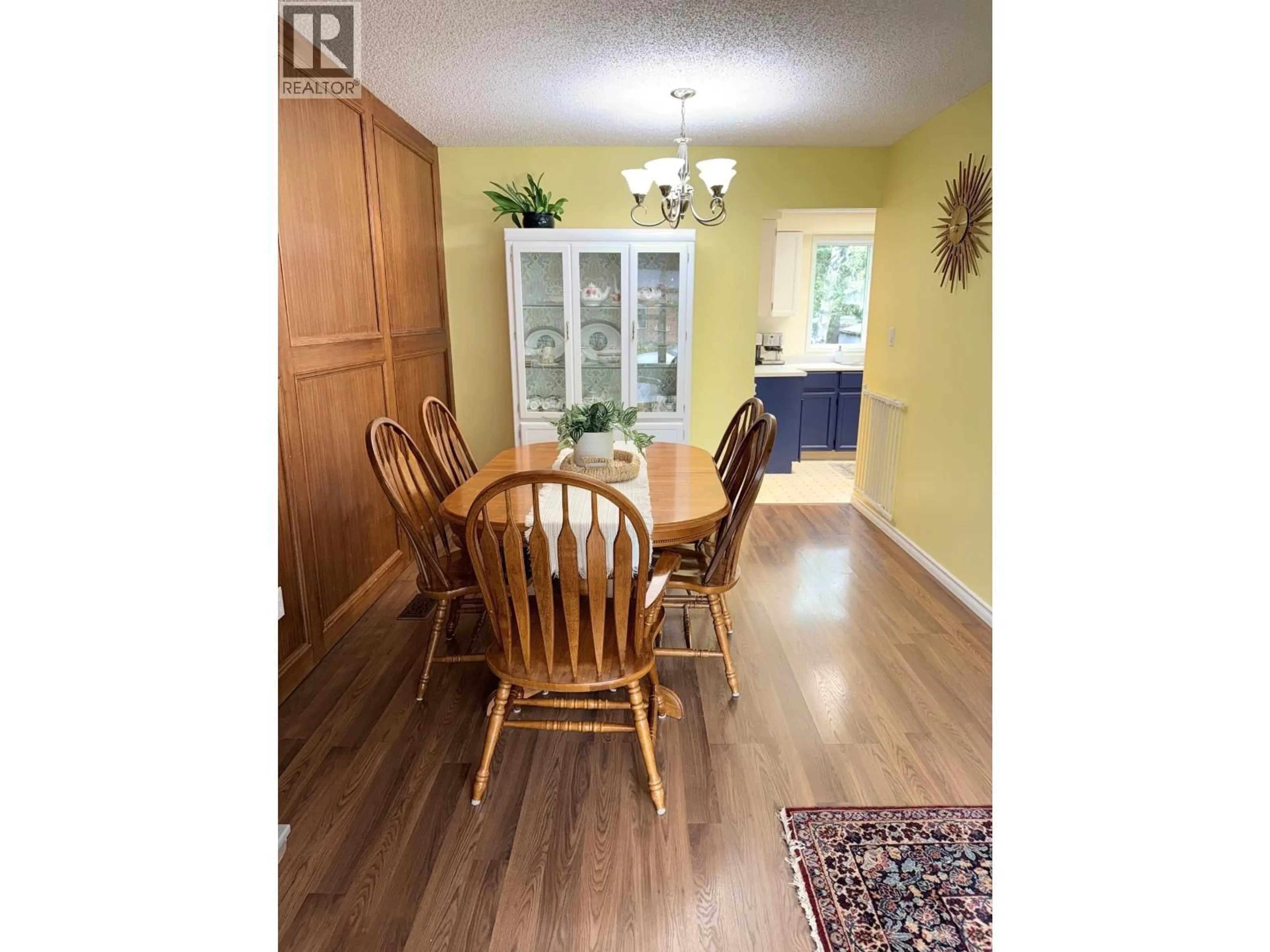 Dining room, wood/laminate floor for 7864 LOYOLA CRESCENT, Prince George British Columbia V2M3V2